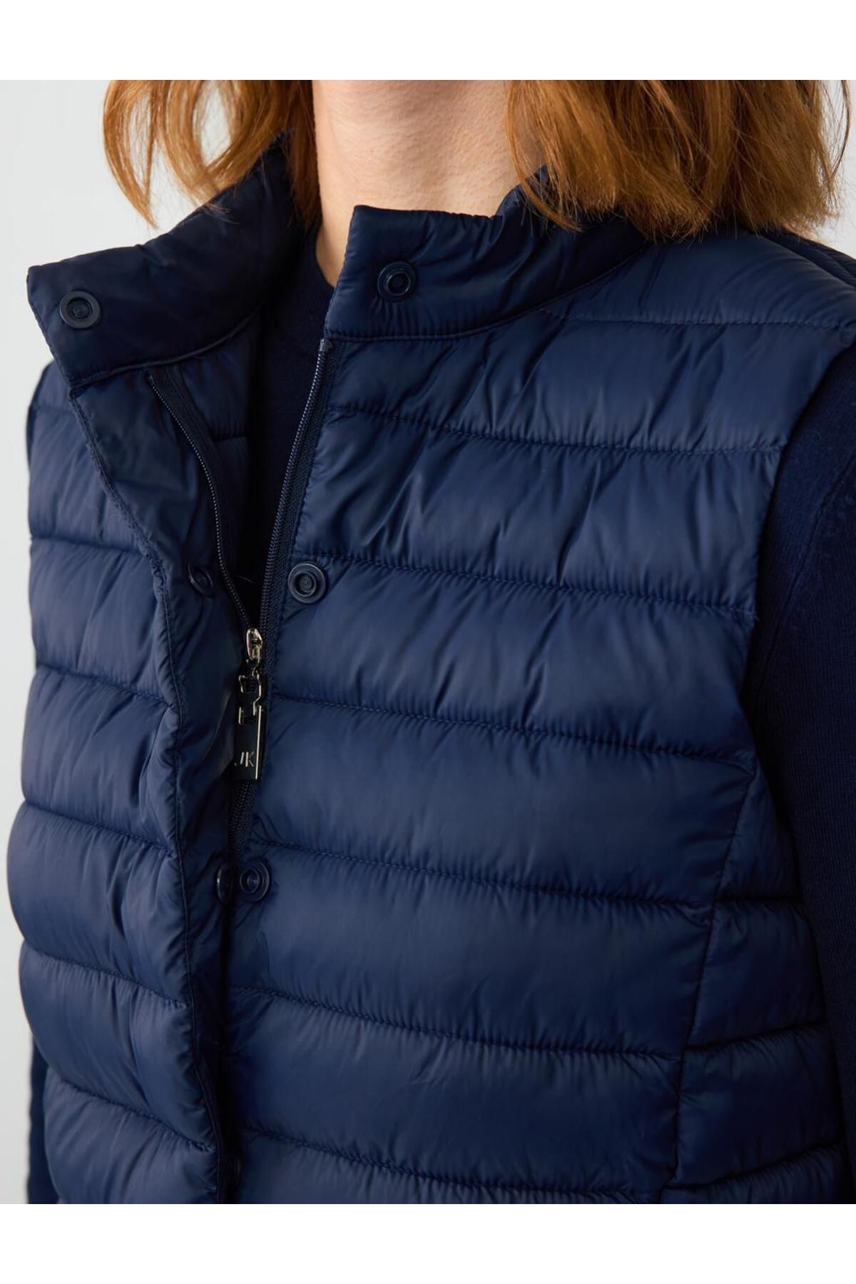 Jimmy Key-Navy Blue Zippered Sleeveless Puffer Vest with Snap Detail 6