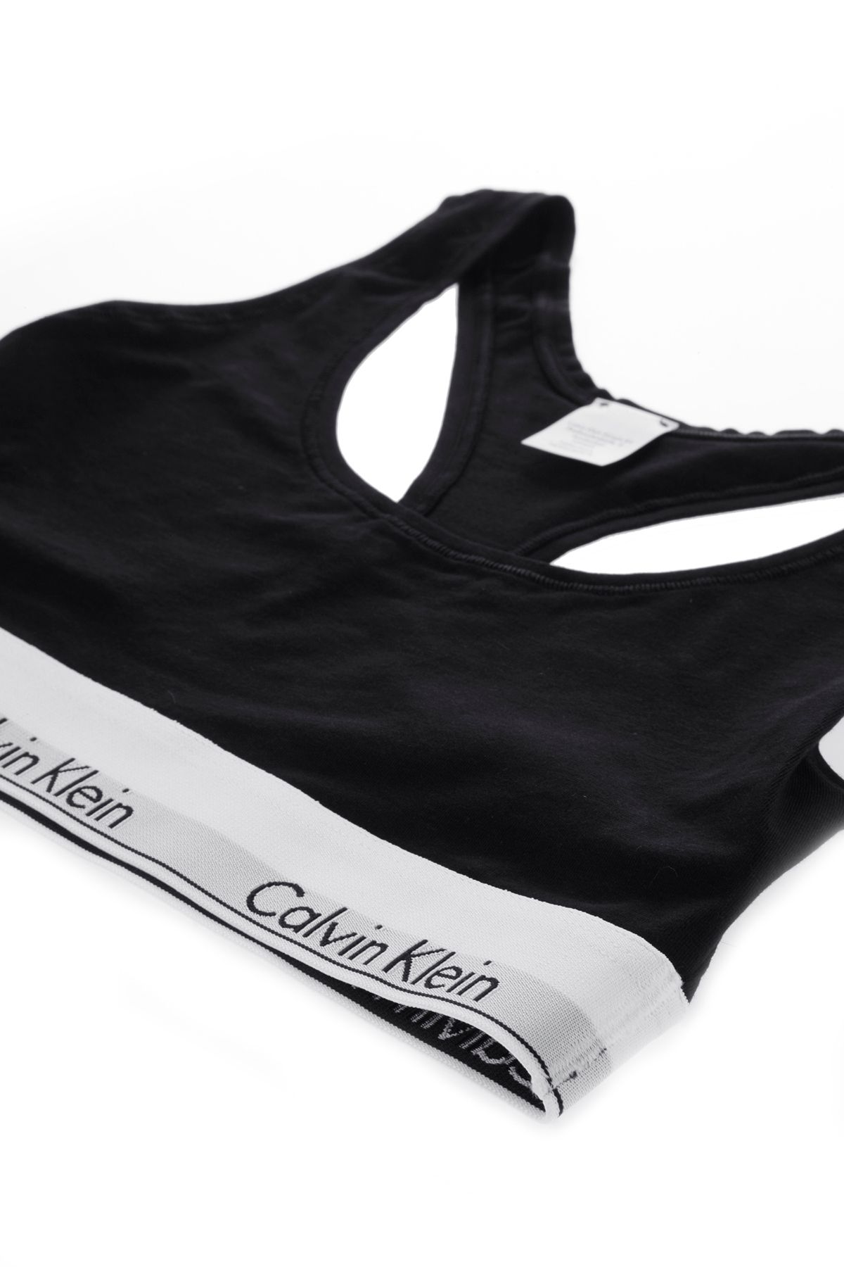 Calvin Klein-Dámská bílá sportovní podprsenka - elastický pásek, minimální design F3785E-100 2