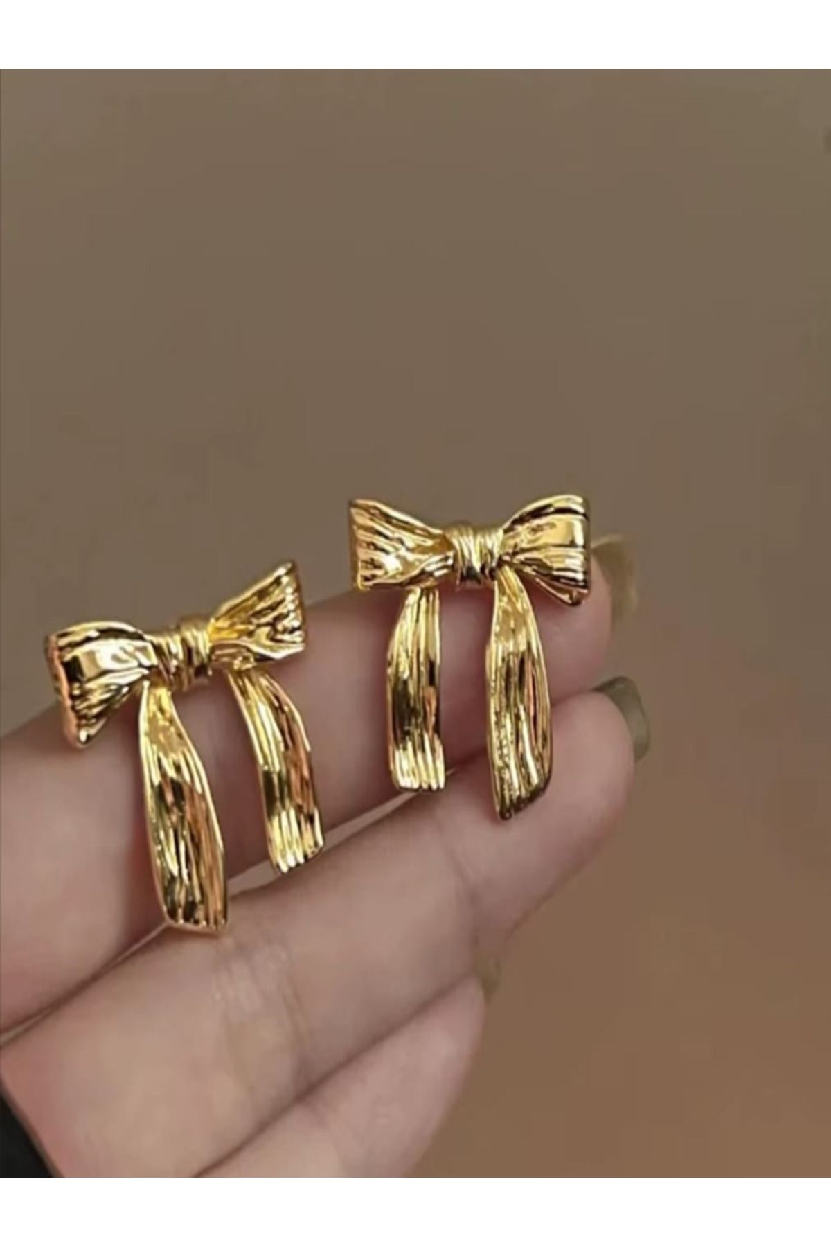 MODA SaŞa kurdela detaylı gold Çelik küpe