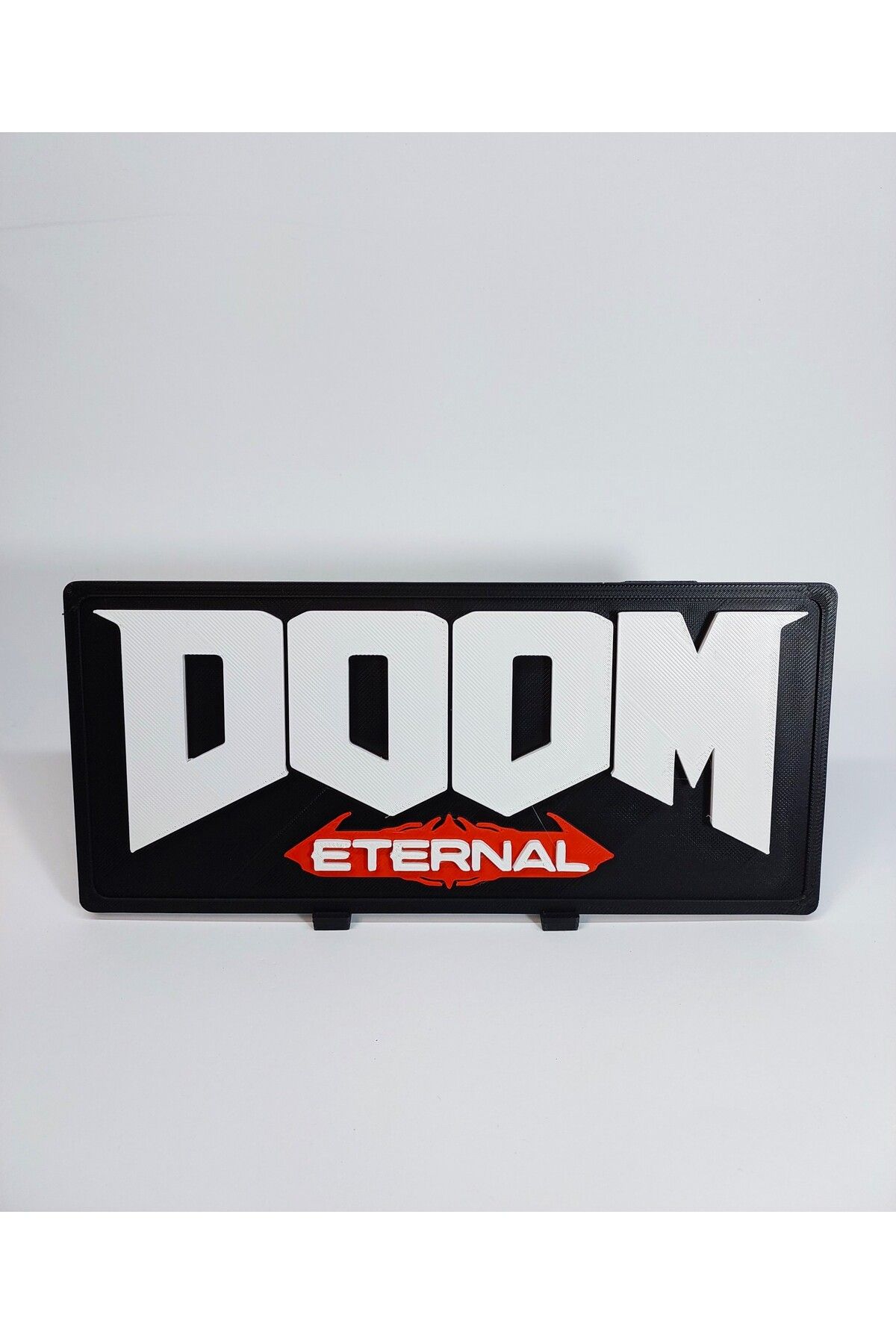 figur DOOM Eternal Logo Tabela