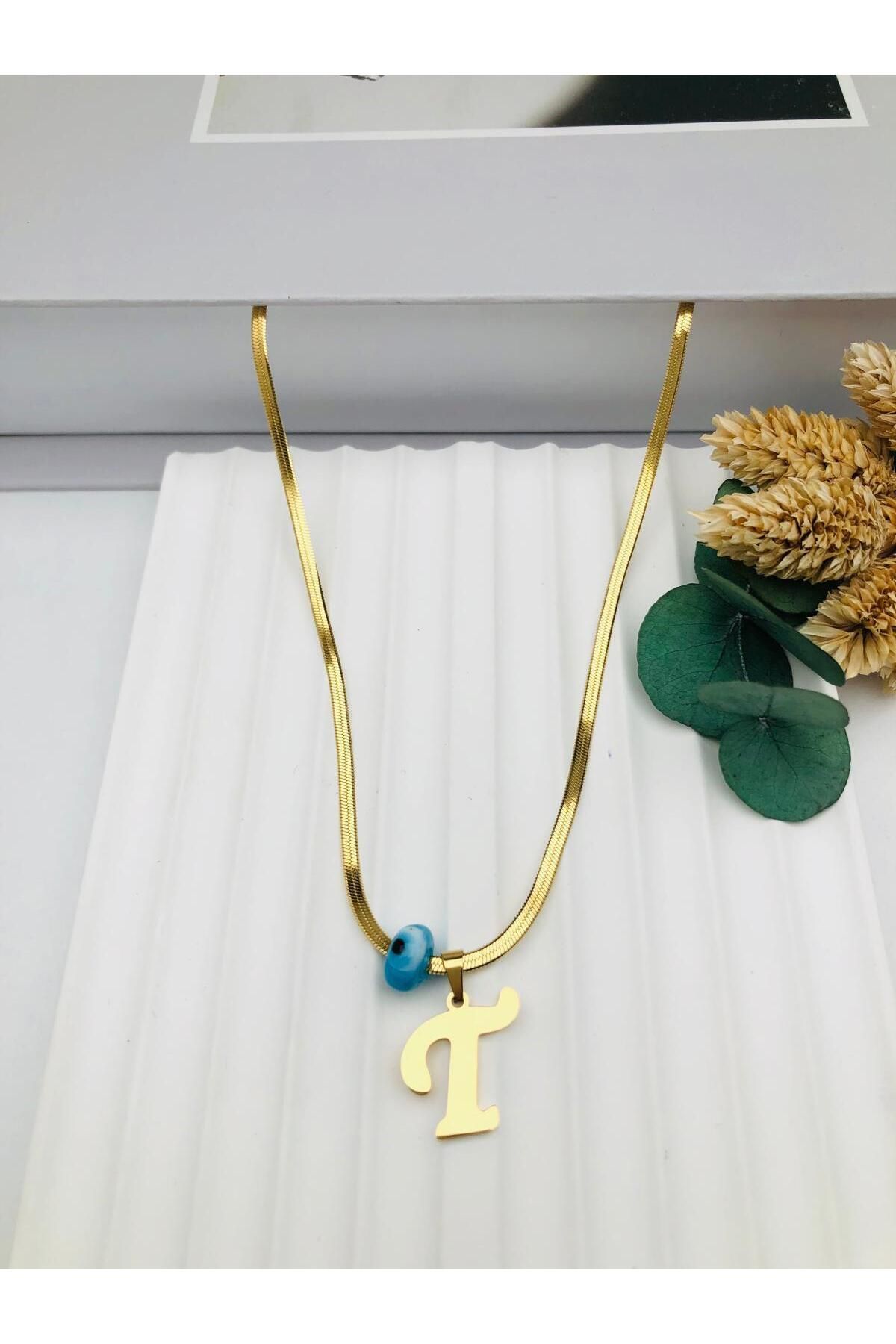 nerede bulurum Nazar Boncuklu İtalyan (T) Harf Çelik Kolye 45 cm (Gold) 0106248
