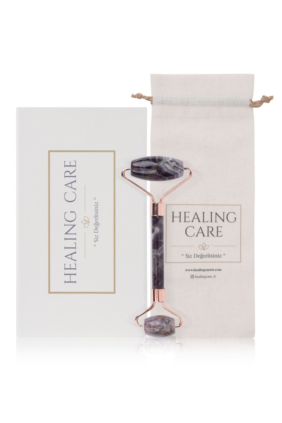 ماساژور صورت دو طرفه غلتک سنگی آمیتیست (همراه با جعبه و کیسه مخصوص) — بنفش Healingcare16 — تصویر 2 از 4