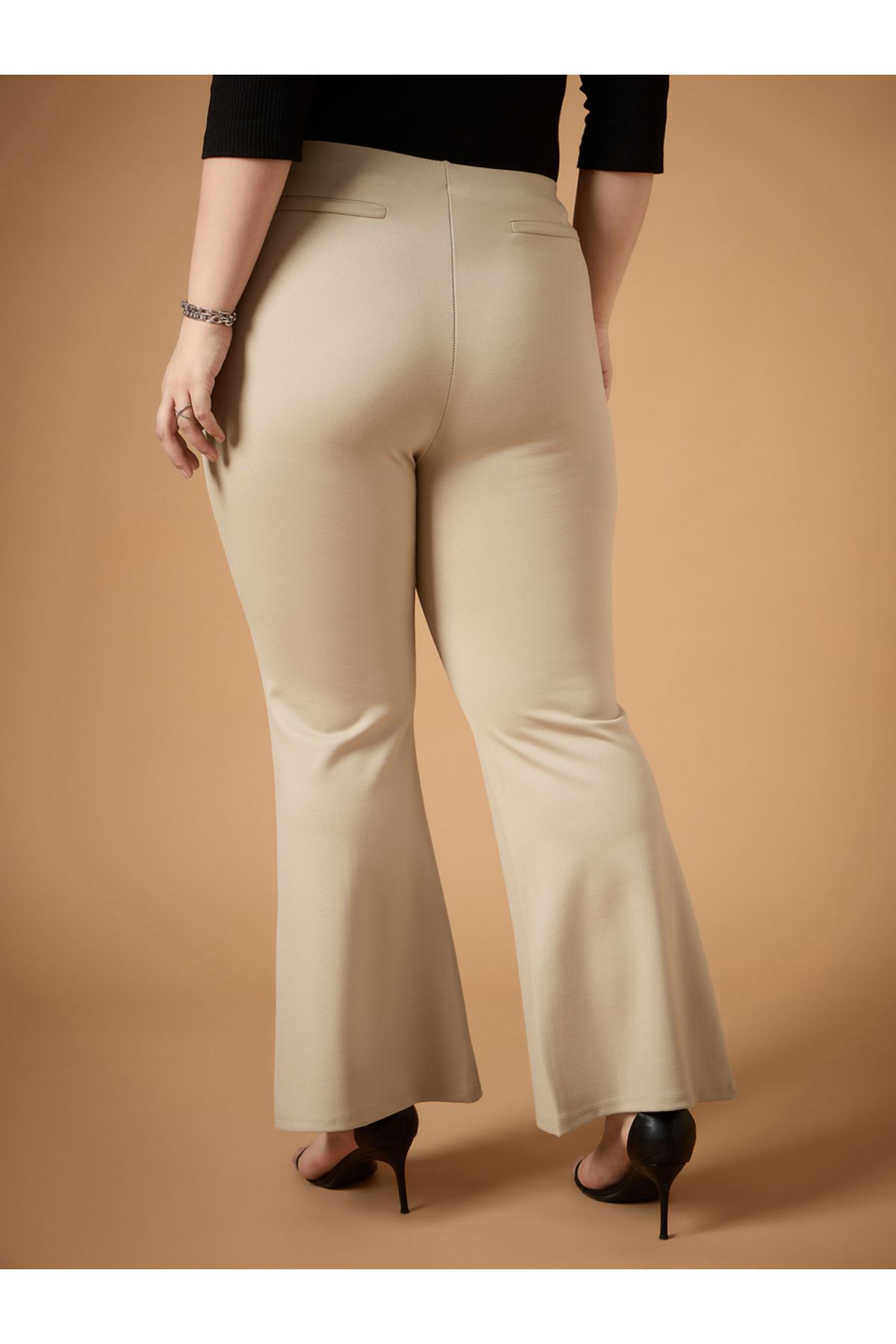 Sassafras By Styli-Plus Size Solid Flared Pants 5