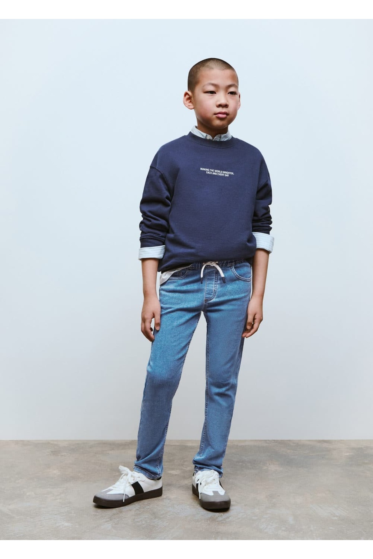 Beli bağcıklı jean pantolon