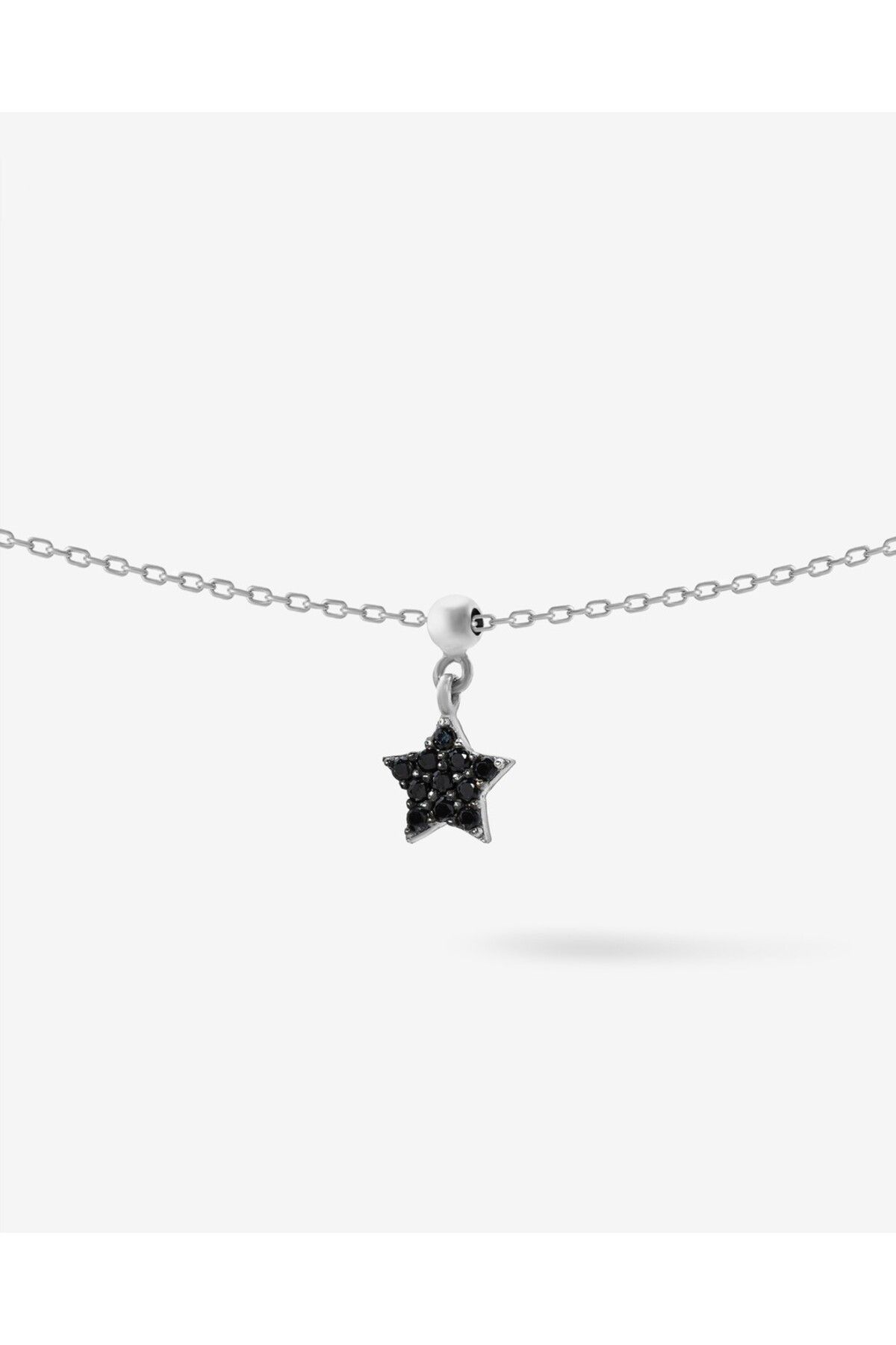 MEKS JEWELS-Black Stone Star Charm 1