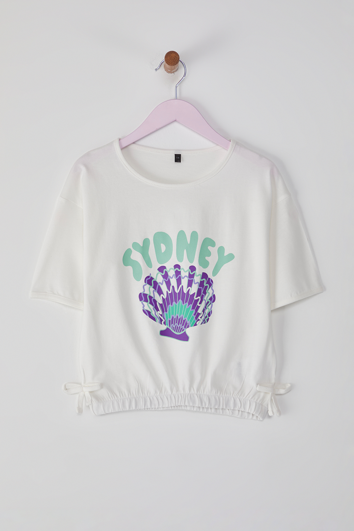 Trendyolmilla Kids Ekru Kız Çocuk %100 Pamuk Şehir Baskılı Eteği Lastikli Kısa Kol Örme T-Shirt TKDSS25TS00060