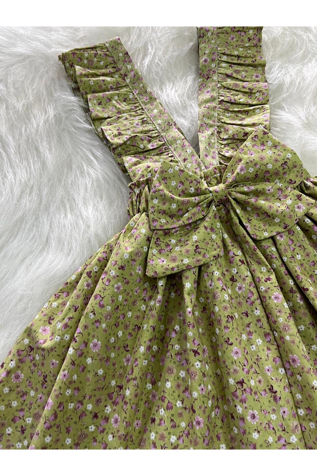 Eylülce Butik KIZ ÇOCUK YEŞİL ÇİÇEKLİ FİYONKLU FIRFIR ASKILI SALOPET ELBİSE  (%100 PAMUK KUMAŞTAN ÜRETİLMİŞTİR.) fotoğrafı 2 (önizleme)