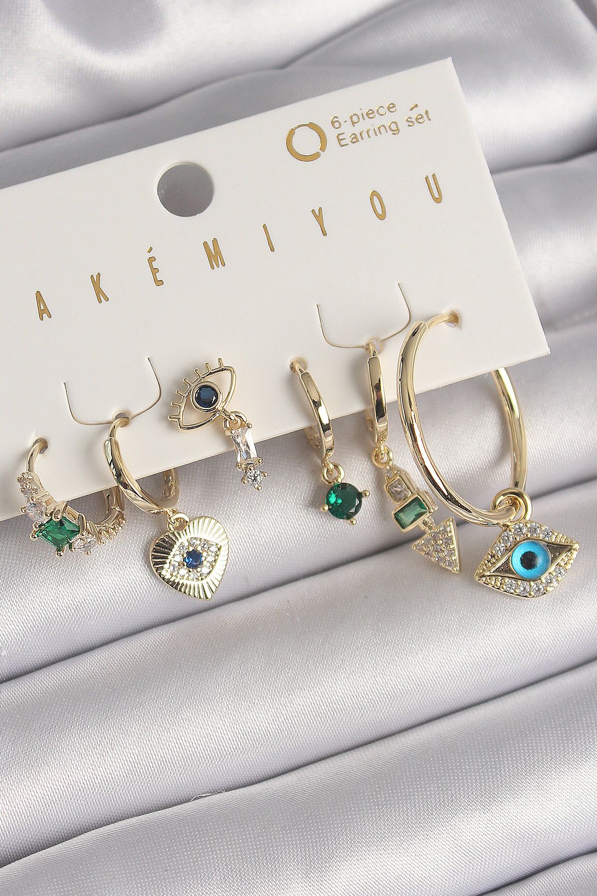 New Things Pirinç Gold Renk Sallantı Zirkon Taşlı Göz Figür VIP Seri Kadın Küpe Seti