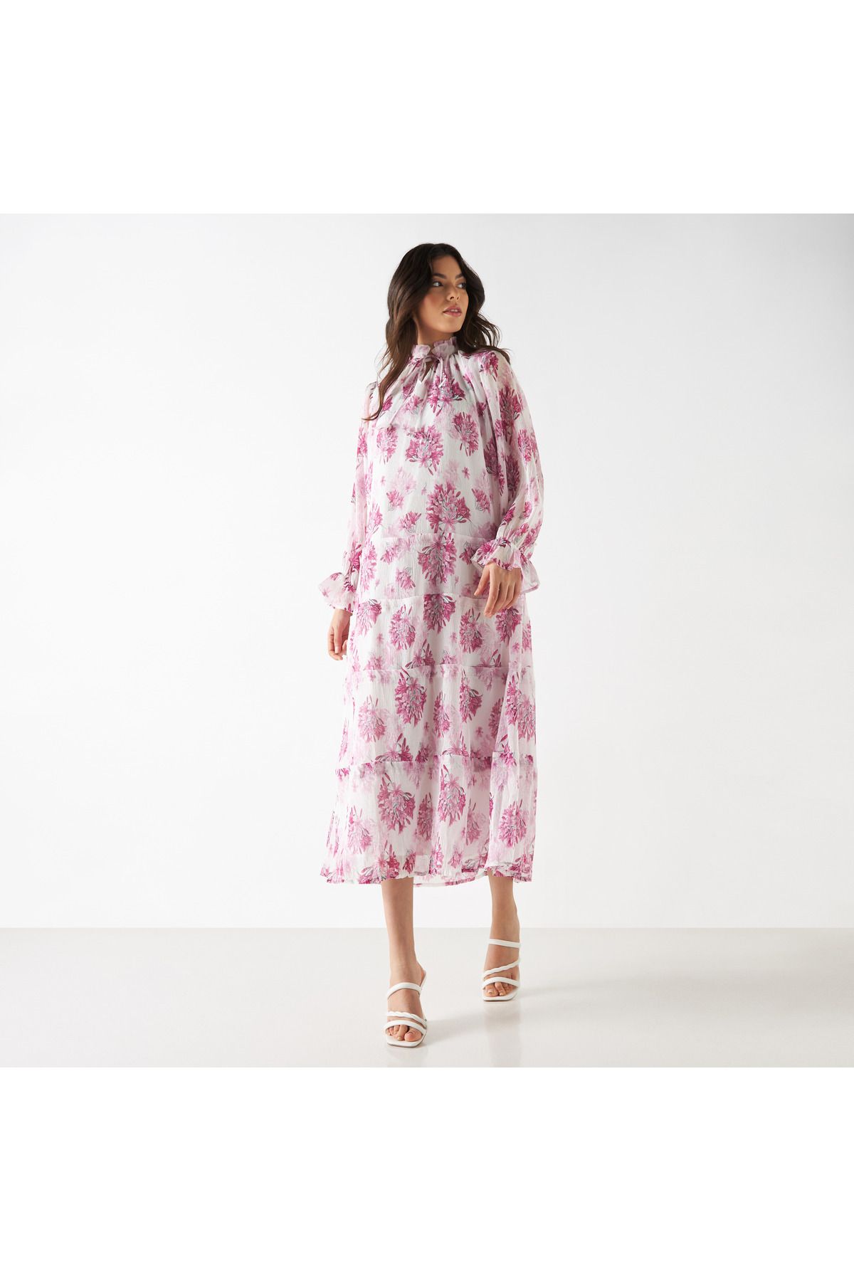Iconic-All-over Floral Print Tiered Dress With Long Sleeves And Neck Tie-ups 3