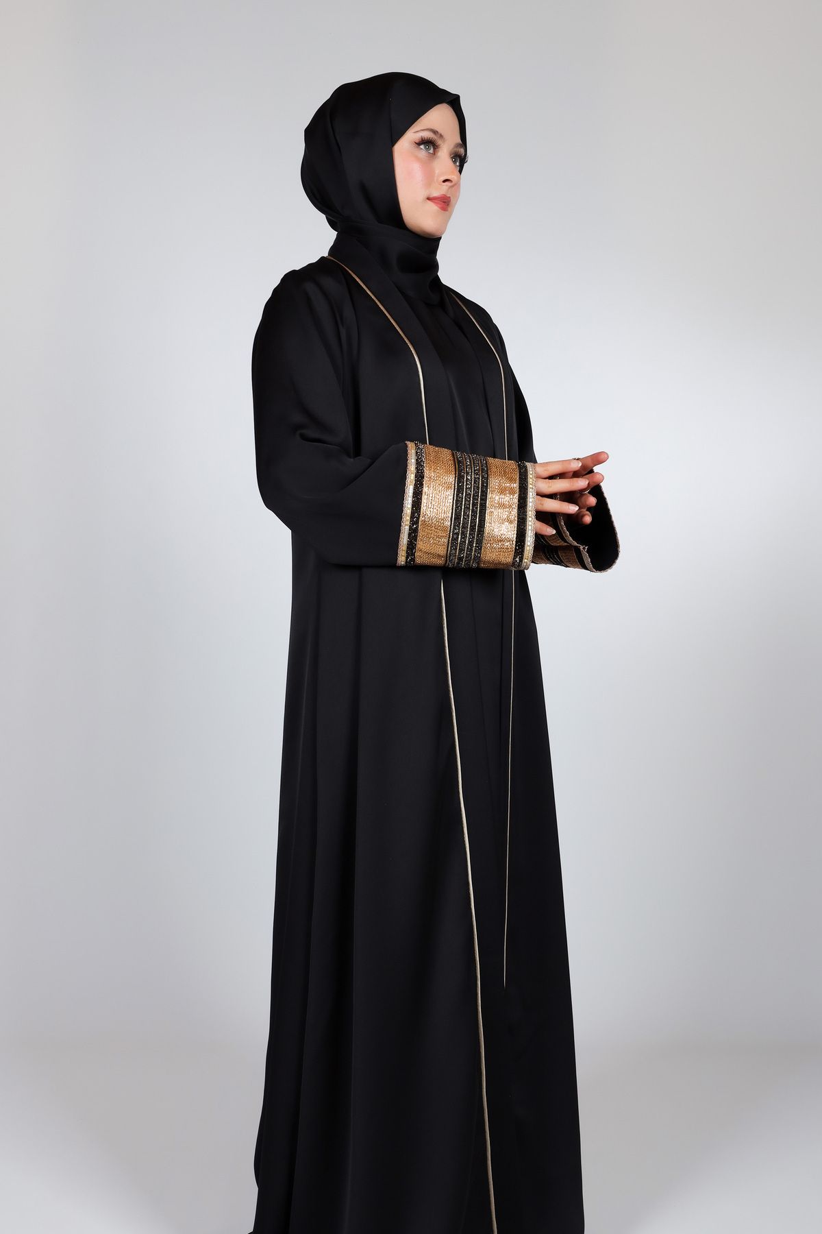 HARİKA WEAR-Luxury Black Abaya - Gold Detailed, Traditional and Modern Design 7
