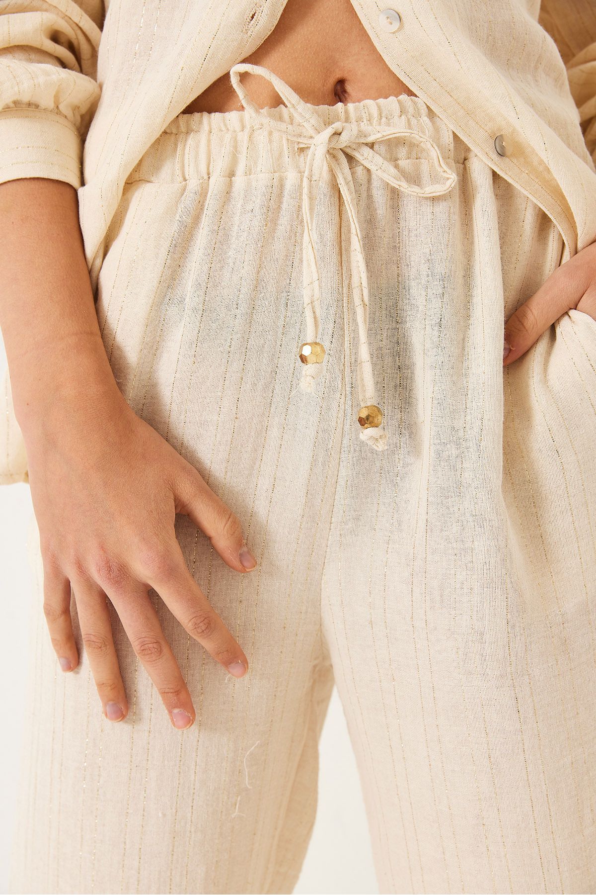Bianco Lucci-Pantaloni Palazzo din muselină aurita, cu buzunare, cu cravată elastică, 80152 60271077 7