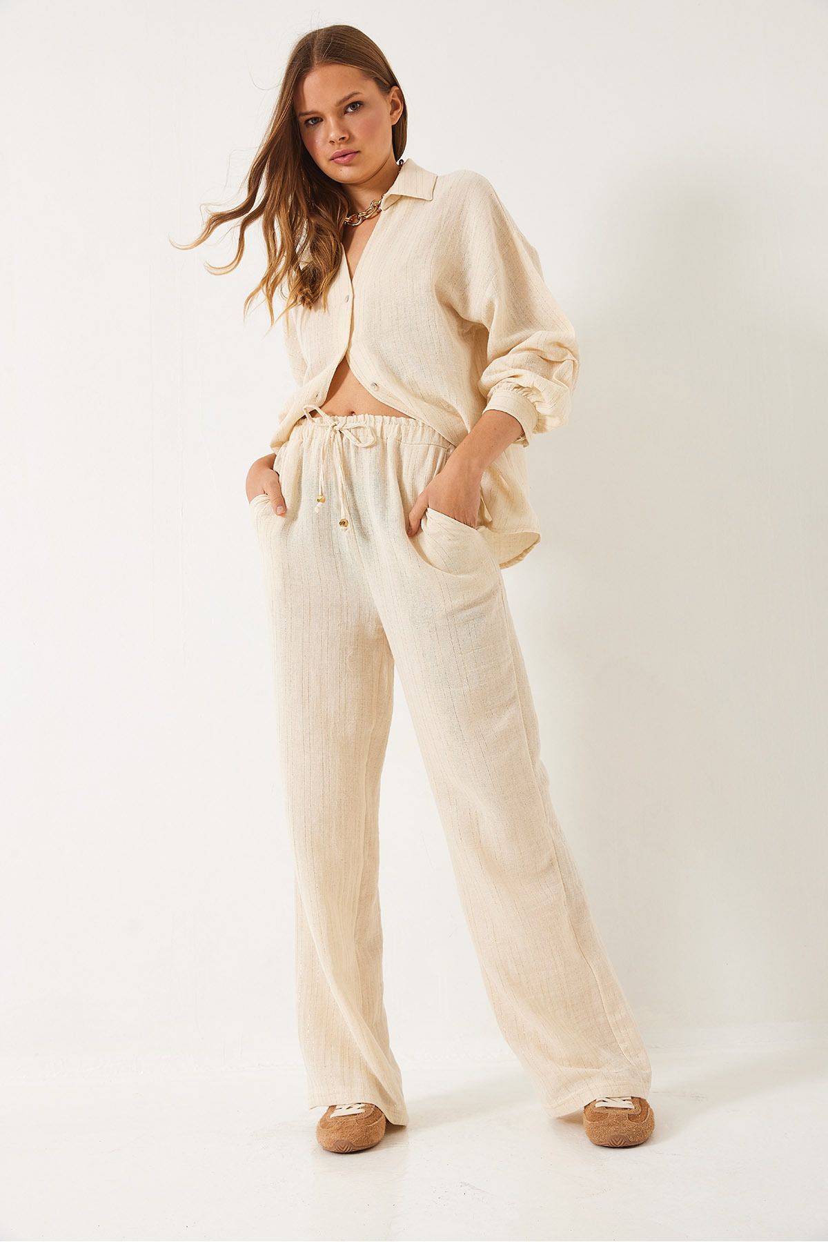 Bianco Lucci-Pantaloni Palazzo din muselină aurita, cu buzunare, cu cravată elastică, 80152 60271077 4