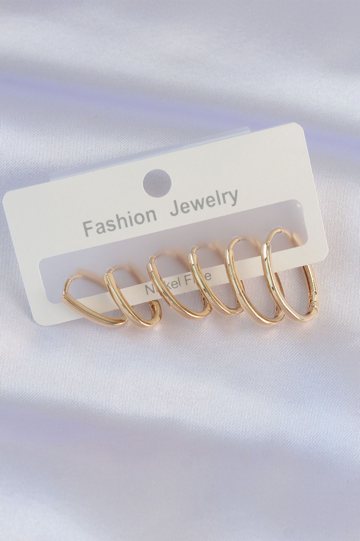 LovelymCo Pirinç Gold Renk İnce Oval Küpe Seti - Lisinya