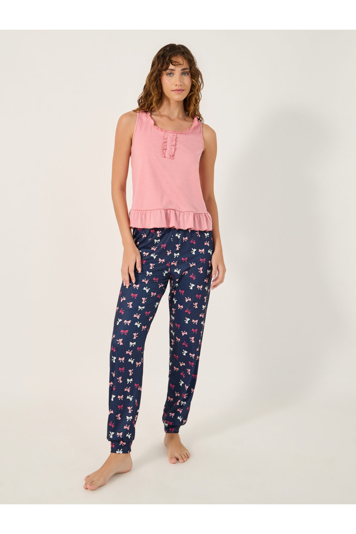 Styli Solid Ruffled Detail Tank Top and Bow Print Cuffed Pyjama Set