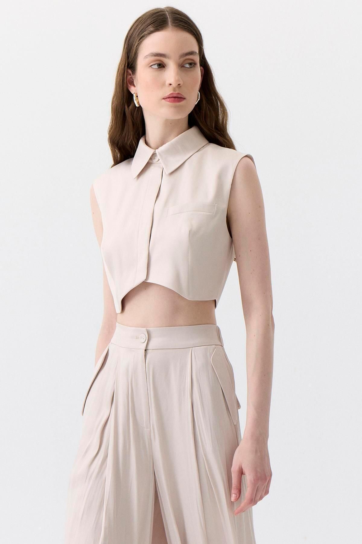 rue.-Asymmetric Cut Sleeveless Ecru Blouse 2