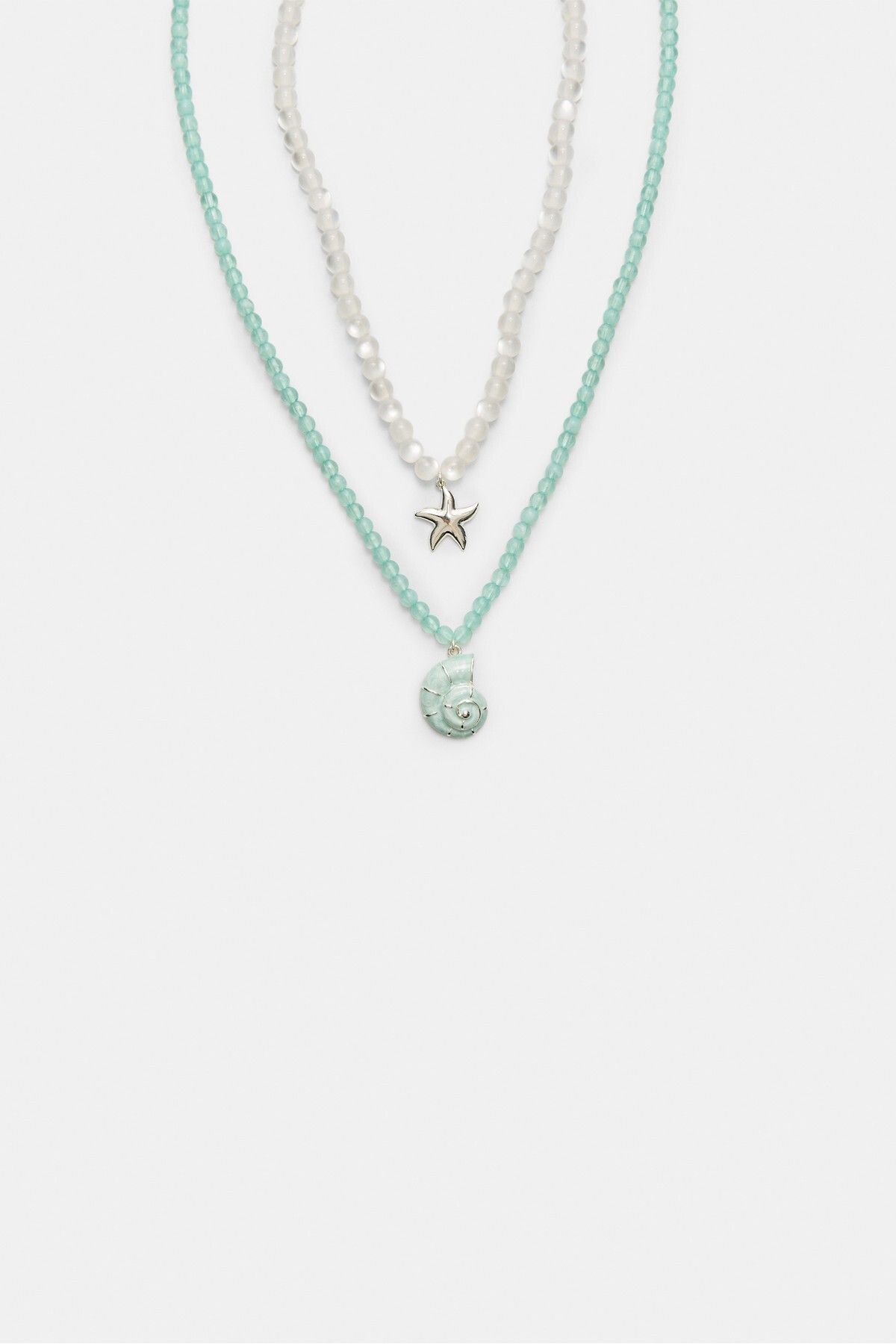Stradivarius-Set of 2 star and seashell necklaces 1