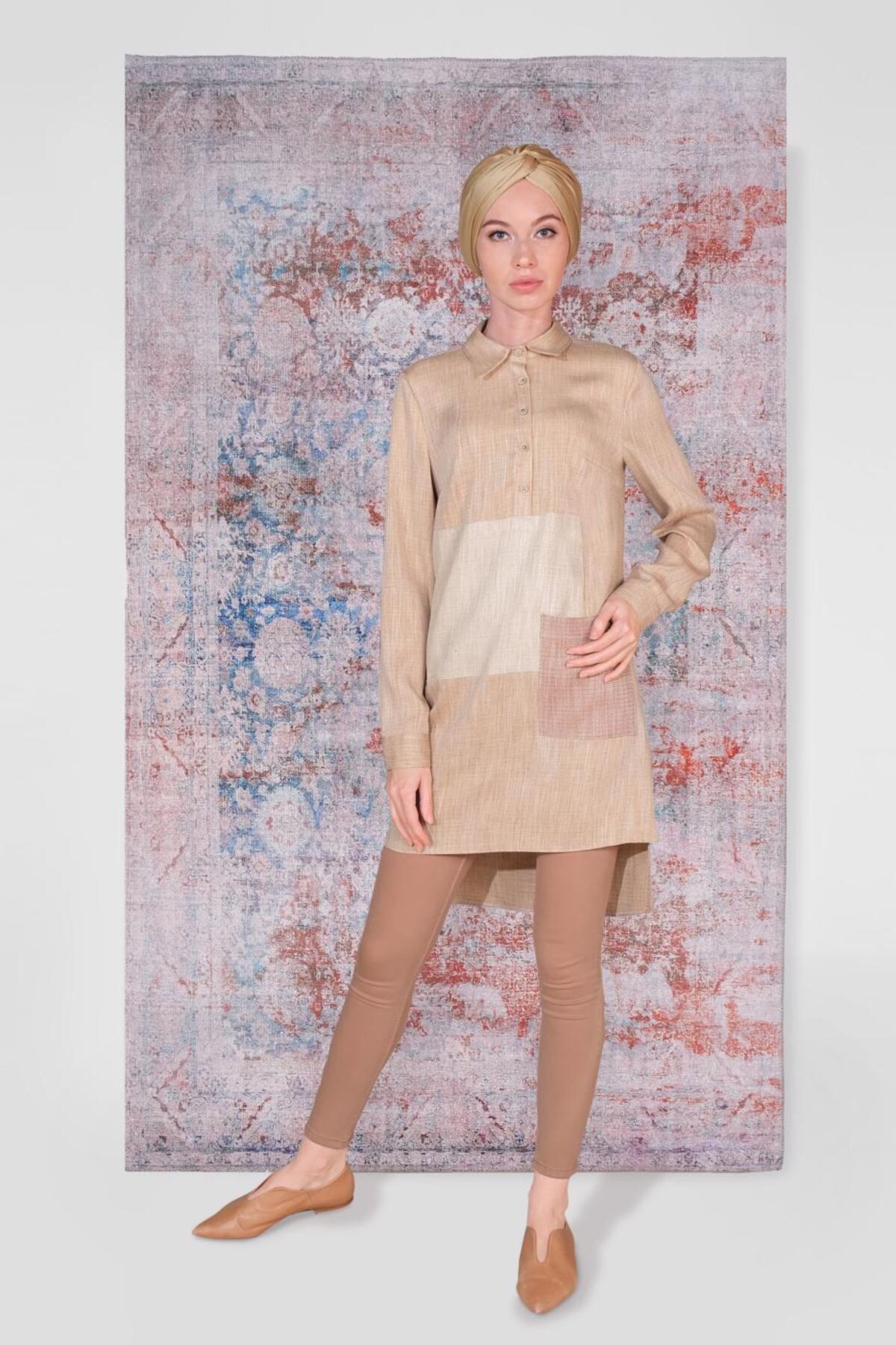 آلوینا تونیک دکمهدار برش نامتقارن ۴۰۶۲۴ آلوینا تونیک دکمهدار برش نامتقارن ۴۰۶۲۴