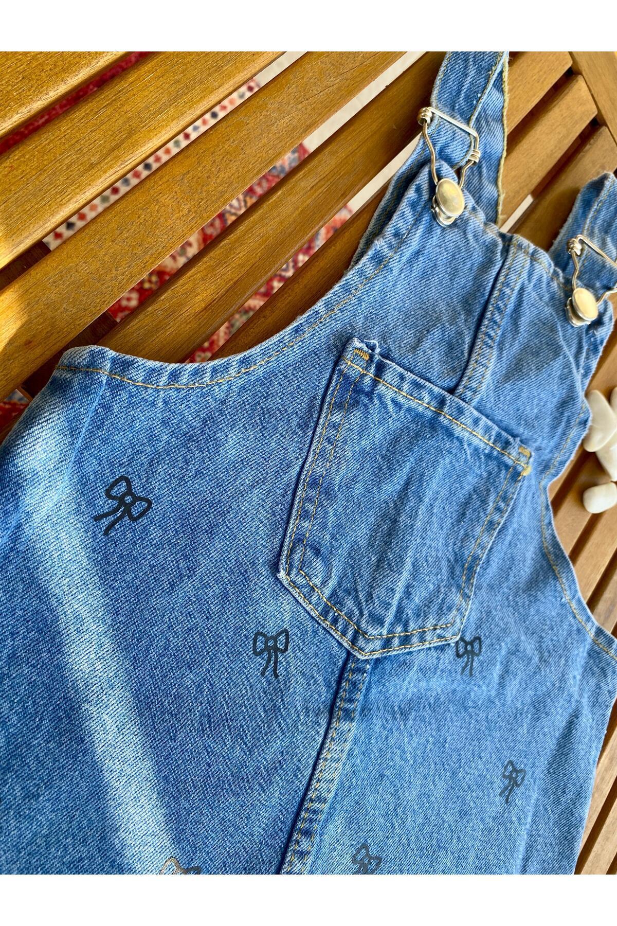 shop Kız Çocuk Kot Kumaş %100 Pamuk Kurdele Baskılı Ayarlanabilen Askı Cepli Salopet Jile Denim Elbise fotoğrafı 5 (önizleme)
