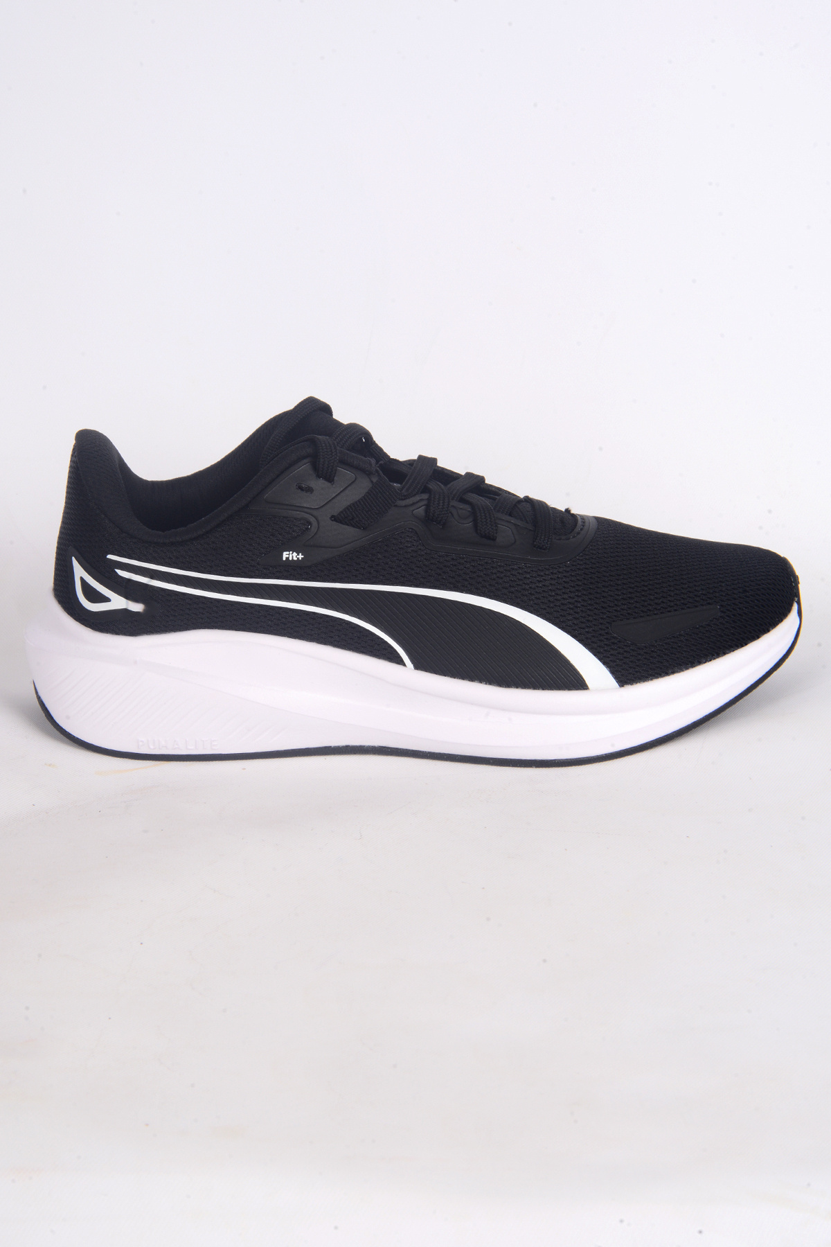 پوما 379437-01 کفش راحتی ارتوپدی مشبک اسکای‌راکت لایت، طرح پاشنه سفید، انعطاف‌پذیر، مشکی روشن، آفتابی