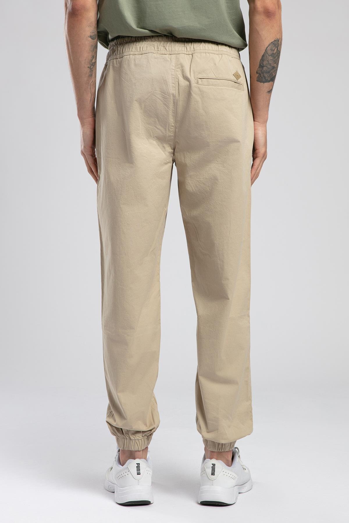 شلوار مردانه Jogger 2 کمر معمولی، فیت راحت، کشسان تا مچ پا، لبه بژ — بژ 5003260137 — تصویر 3 از 5