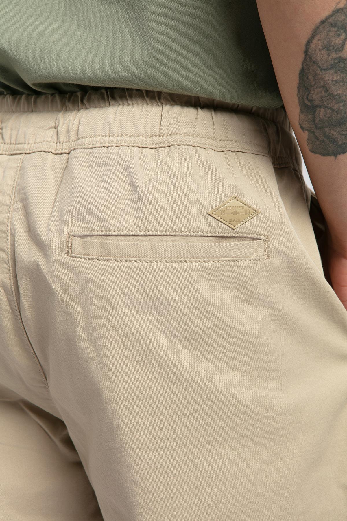 شلوار مردانه Jogger 2 کمر معمولی، فیت راحت، کشسان تا مچ پا، لبه بژ — بژ 5003260137 — تصویر 5 از 5