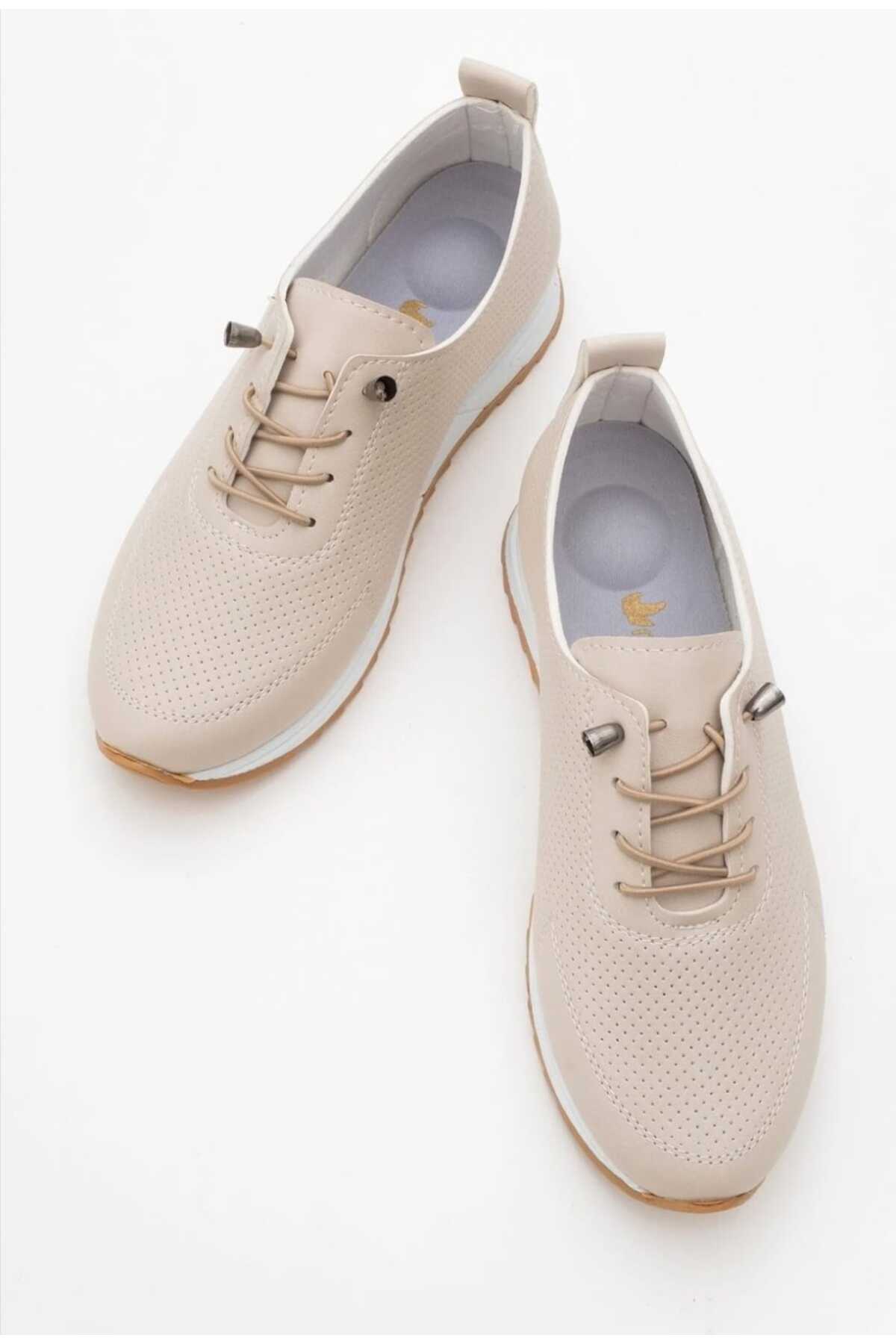 أحذية رياضية يومية مرنة ومثقبة ومريحة من المطاط ون...