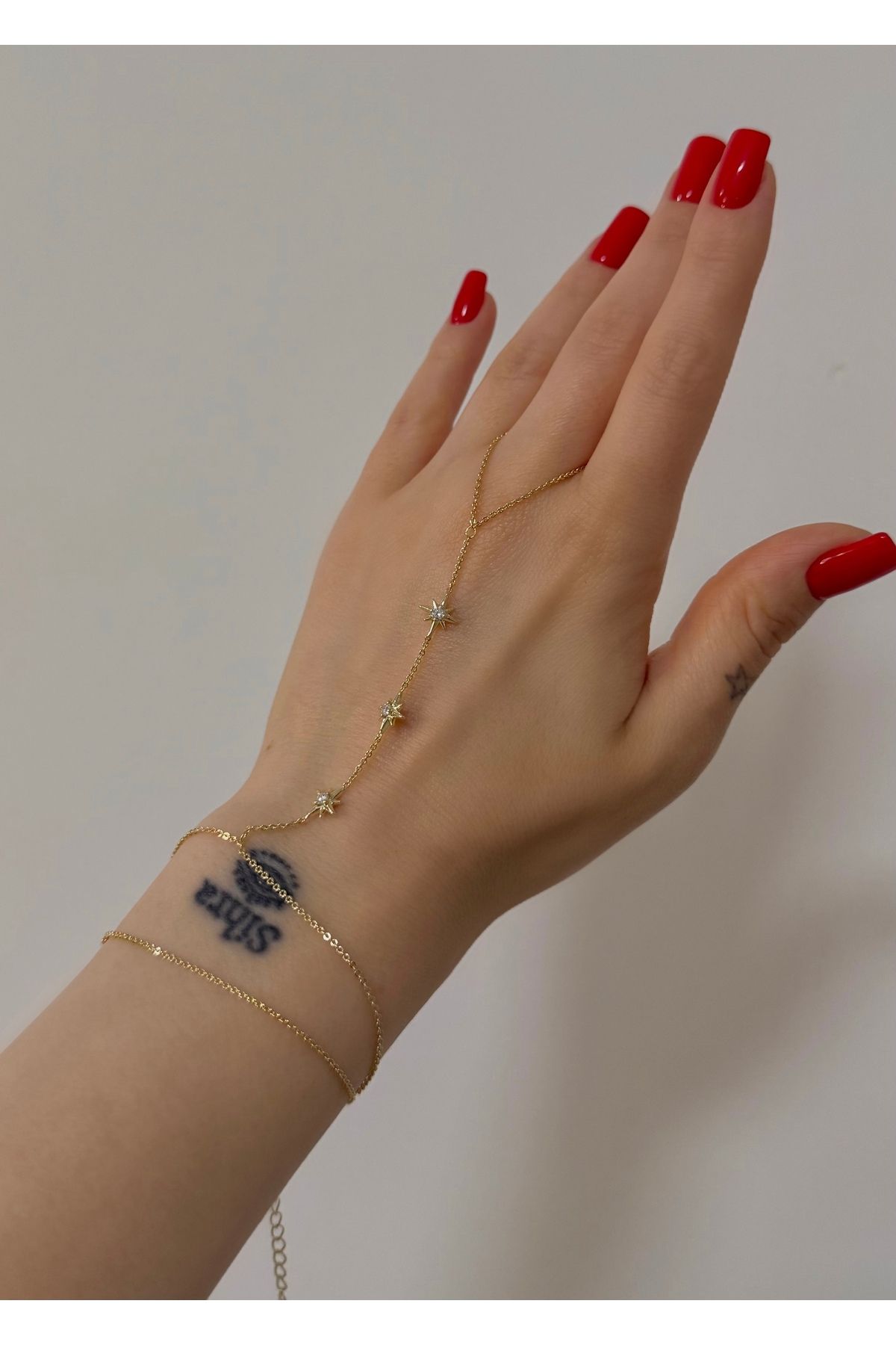 Home Sihra Accessories Yıldız detaylı zirkon taşlı gold renk şahmeran