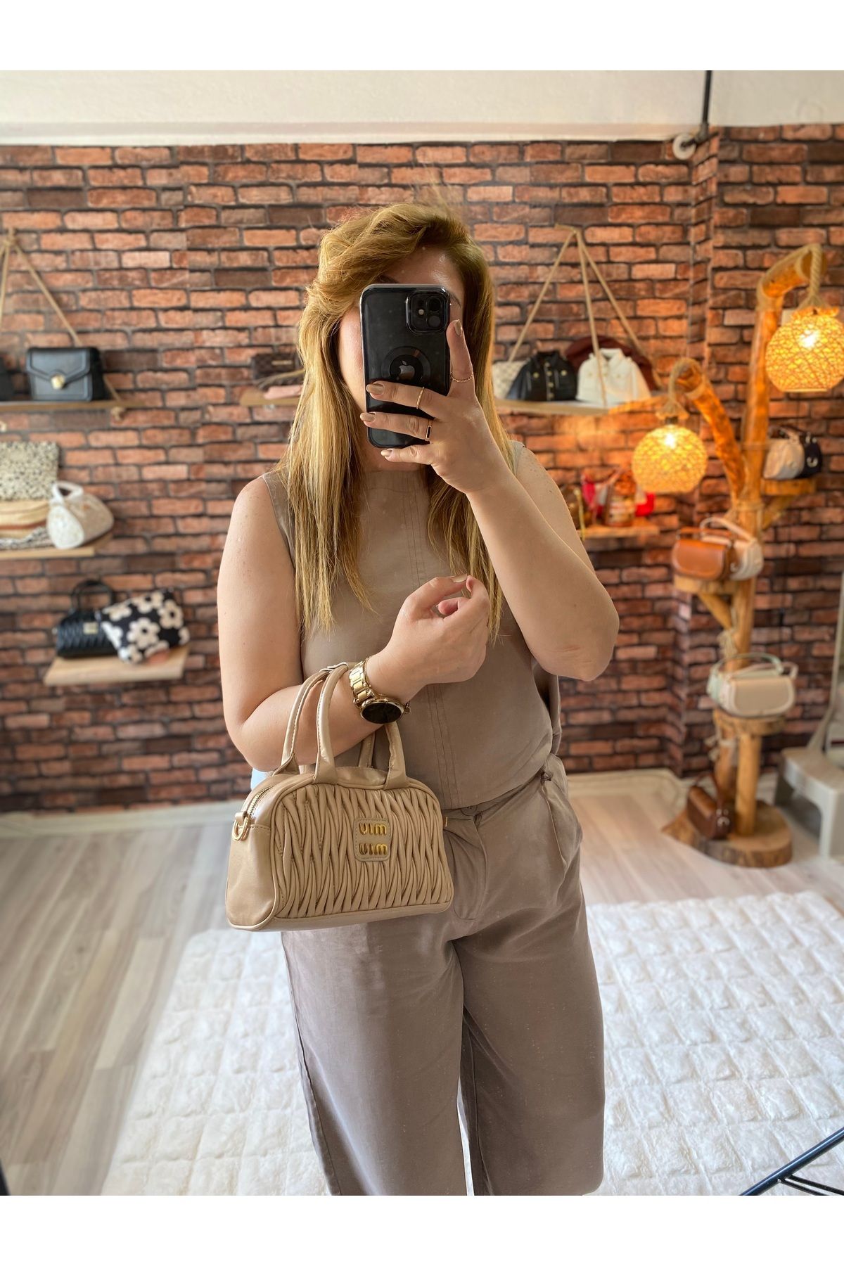 eladabags Krem renk askılı şık tasarım çanta