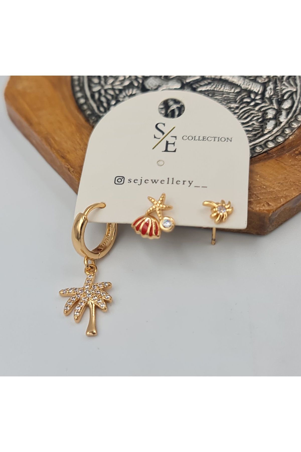 SE Jewellery Collection Selin Ersoy Rose Renk Plaj Temalı 3'lü Xuping Küpe Seti – Palmiye, Deniz Yıldızı ve Kabuk Figürlü