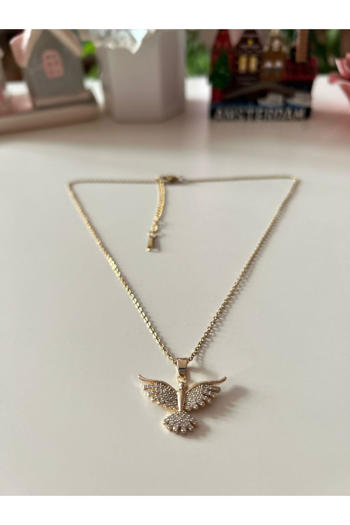 Cheecky Chic Uçuşta Stil Var: Zirkon Taş Kanatlı Gold Çelik Kuş Kolye