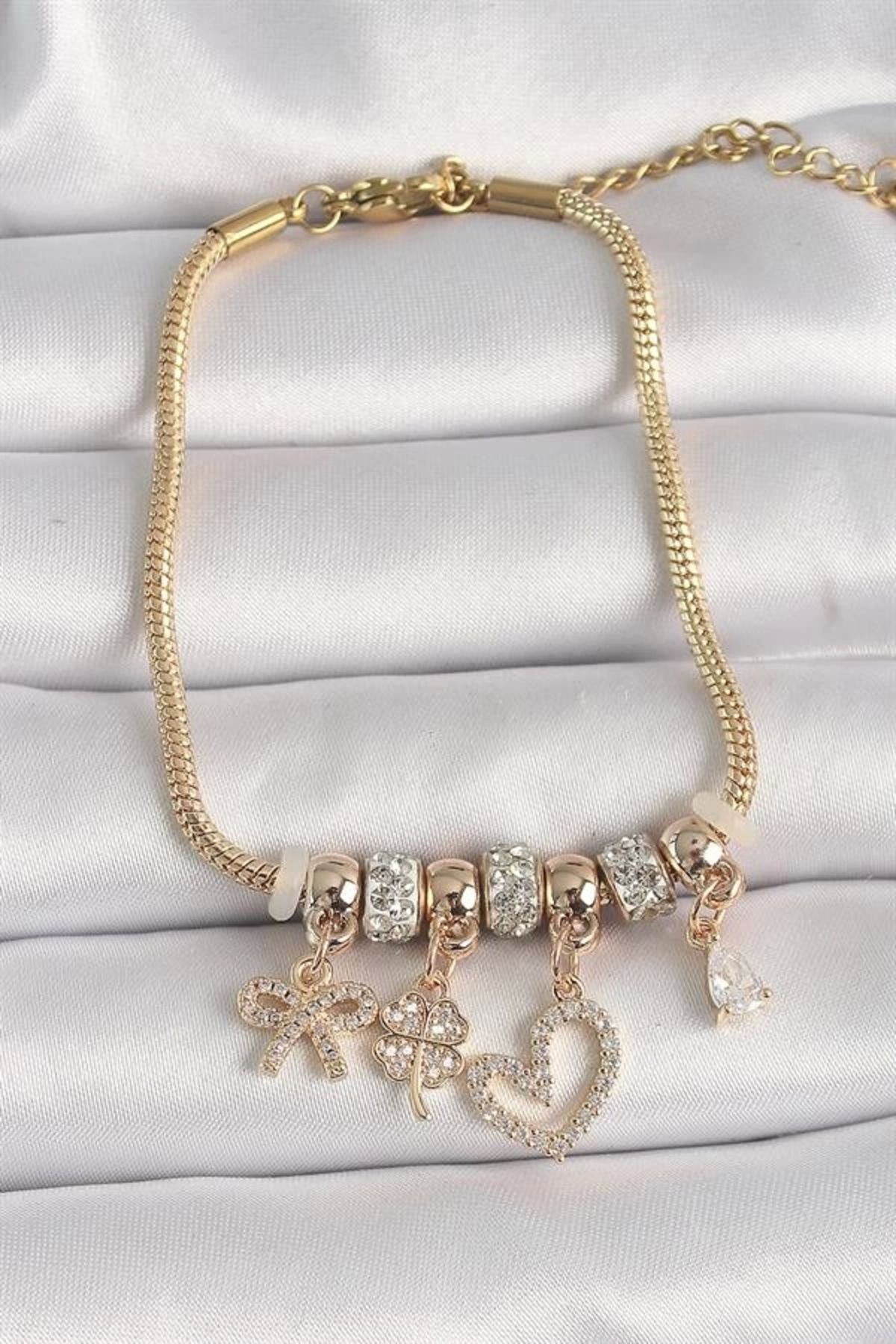 FASHIONLINE Pirinç Gold Renk Zincir Sallantı Zirkon Taşlı Kalp Figür Yonca Detay Kadın Bileklik