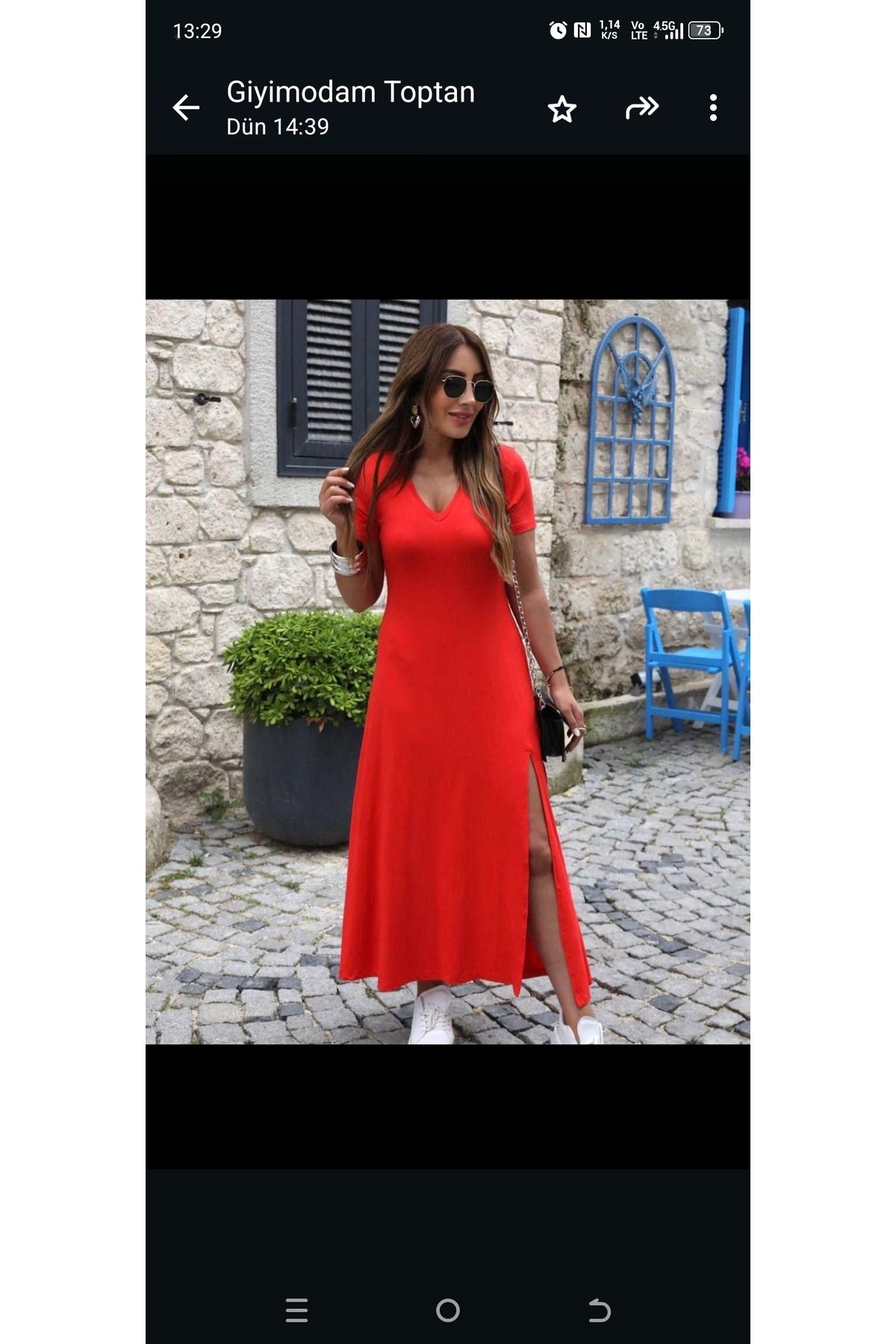 Butik Kısa kollu V yaka yandan yırtmaçlı penye rahat kalıp zarif elbise