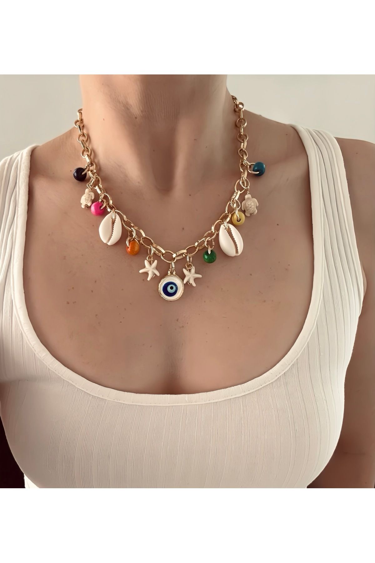 Maiden design Gold renk nazar boncuğu ve deniz kabugu kolye