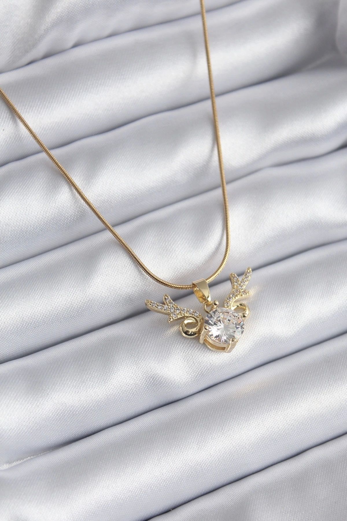 STOREMAX 316L Çelik Gold Renk Zirkon Taşlı Boynuz Model Kadın Kolye