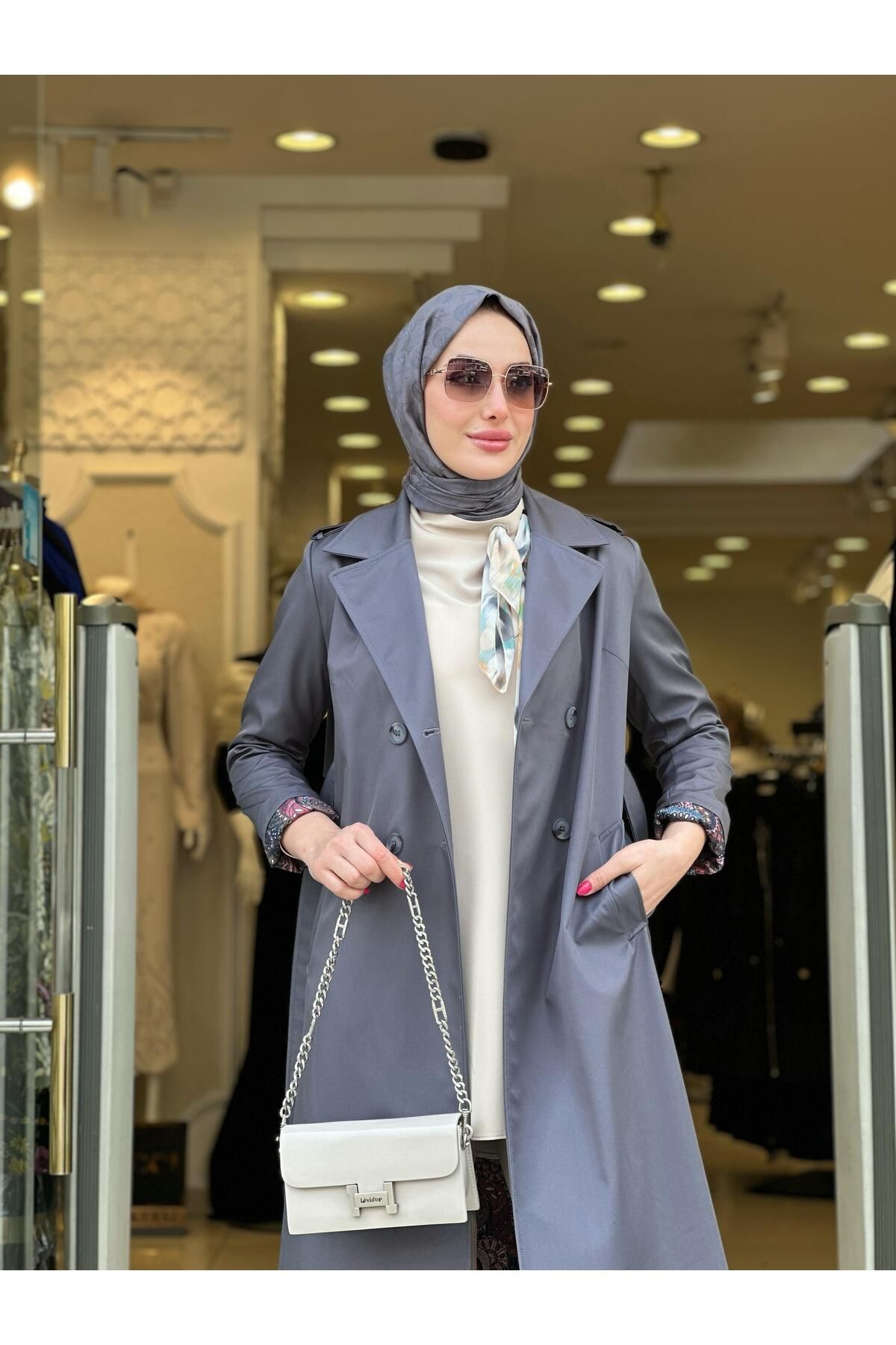 MODA trenç