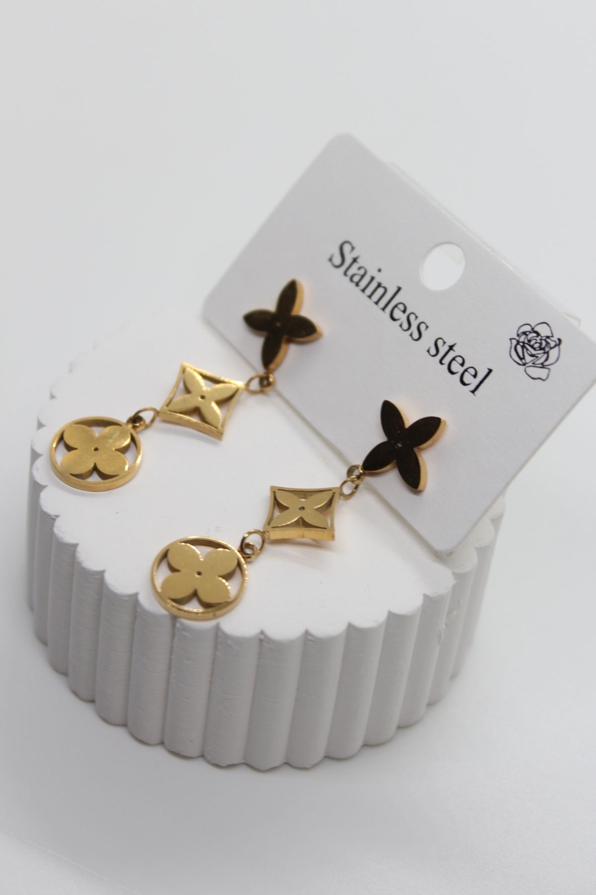 stainles steel Çiçek ve Yıldız Model Sallantılı Gold Kadın Çelik Küpe