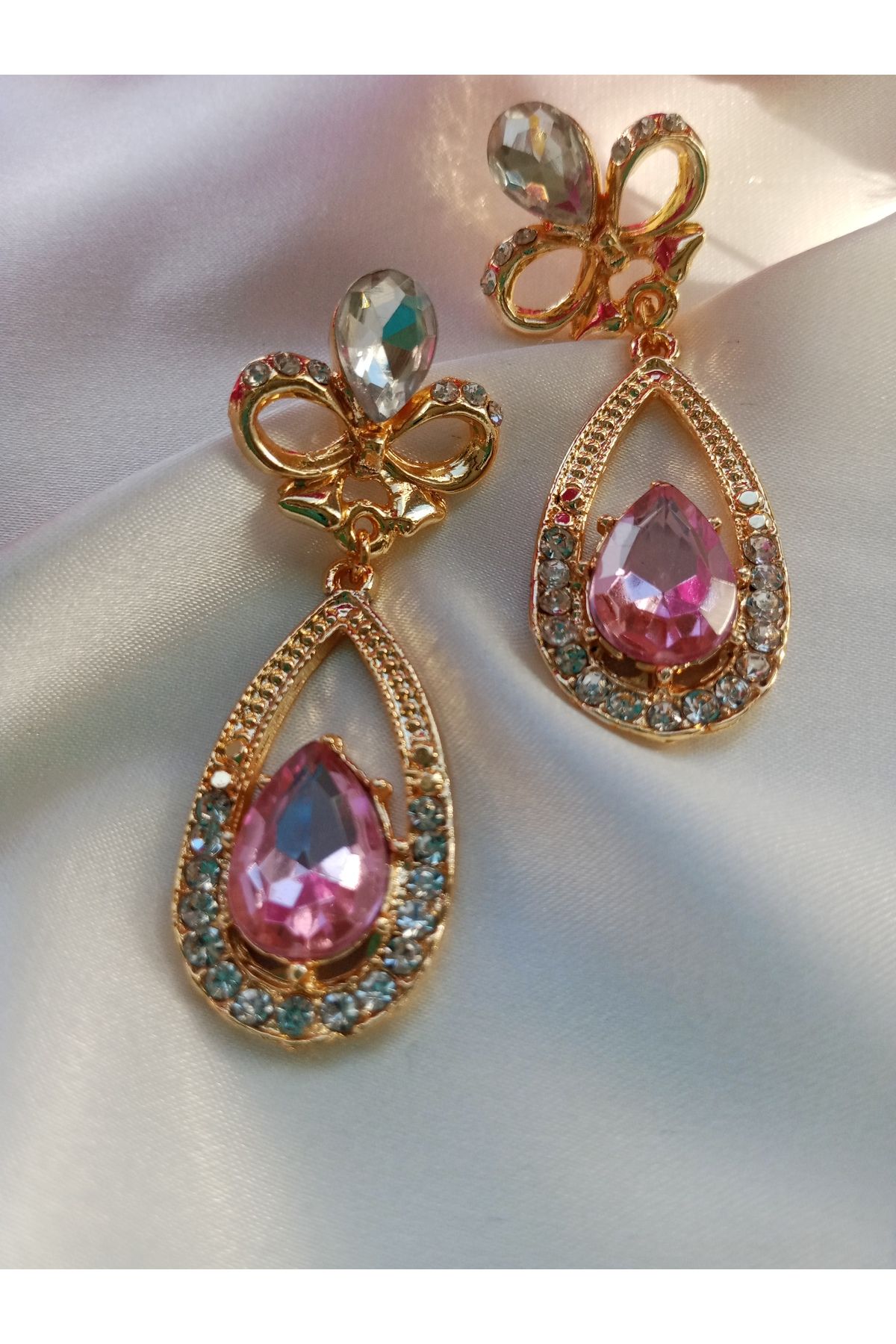 Pervin Ablacım El yapımı toz pembe sallanan Gold küpe