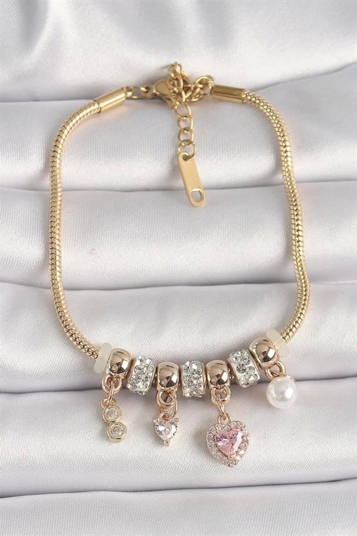 FASHIONLINE Pirinç Gold Renk Zincir Zirkon Taşlı Sallantı Kalp Model İnci Detay Charm Kadın Bileklik