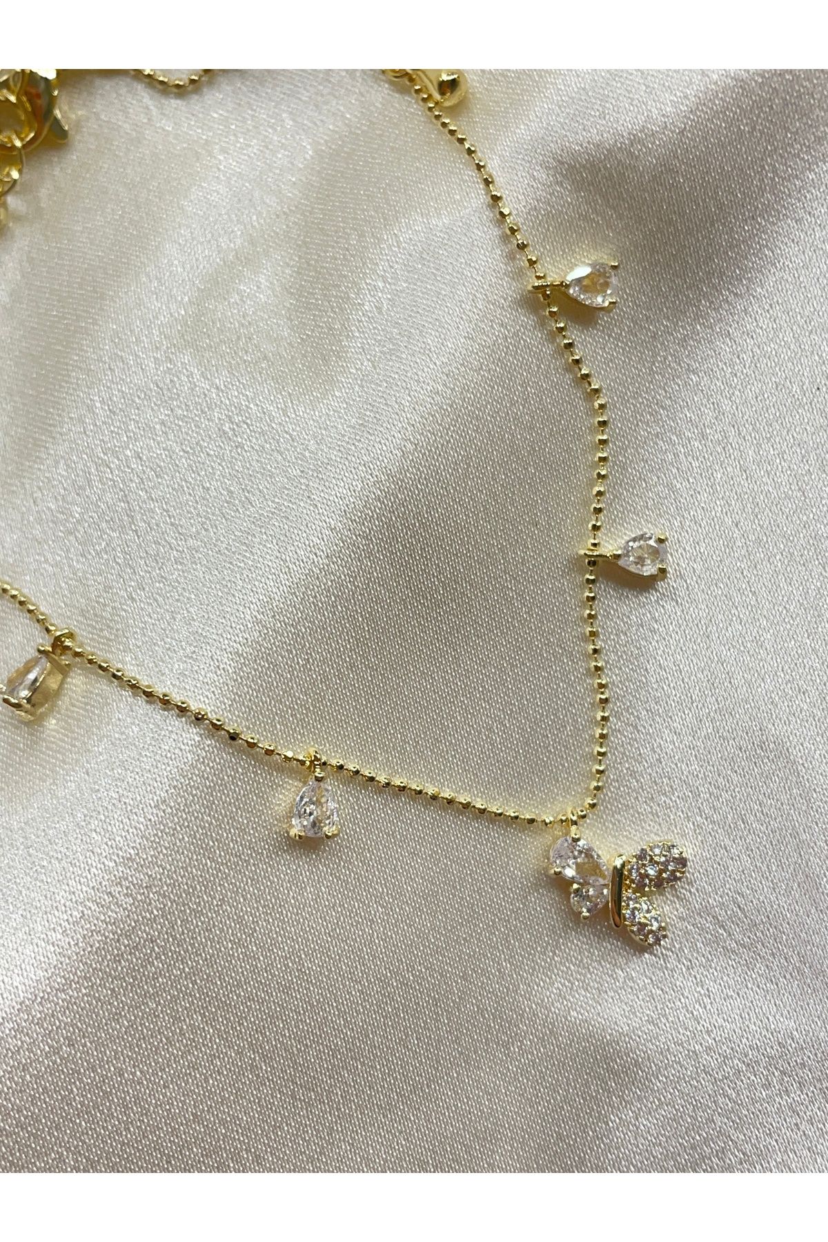 Onsiletişim LOTUSBYBUKET çelik gold kelebek sembol taşlı özel tasarım halhal