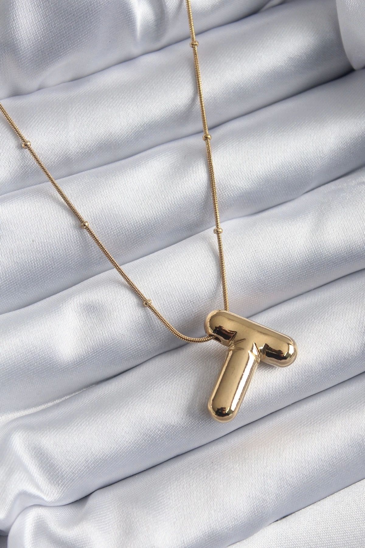 Clariss 316L Çelik Gold Renk Bubble "T" Harf Model Kadın Kolye