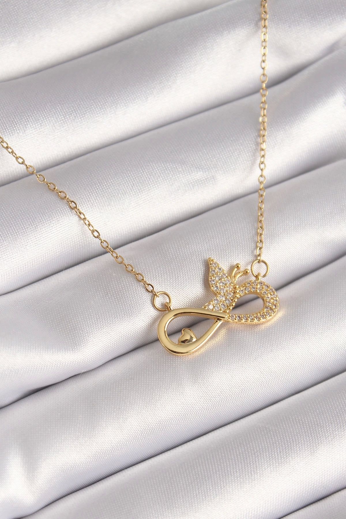Clariss 316L Çelik Gold Renk Zirkon Zincir Taşı Sonsuzluk Kelebek Model Kadın Kolye