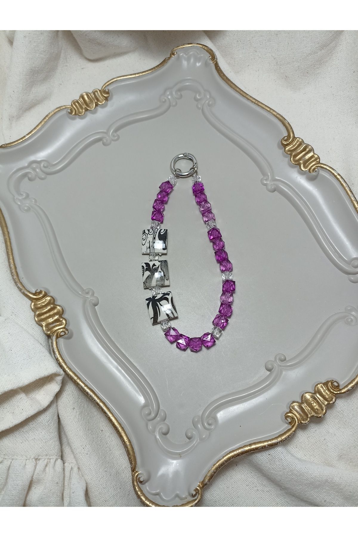 ida design store mor kristal boncuk ile çiçek motifli detay ile çanta ve telefon charmı