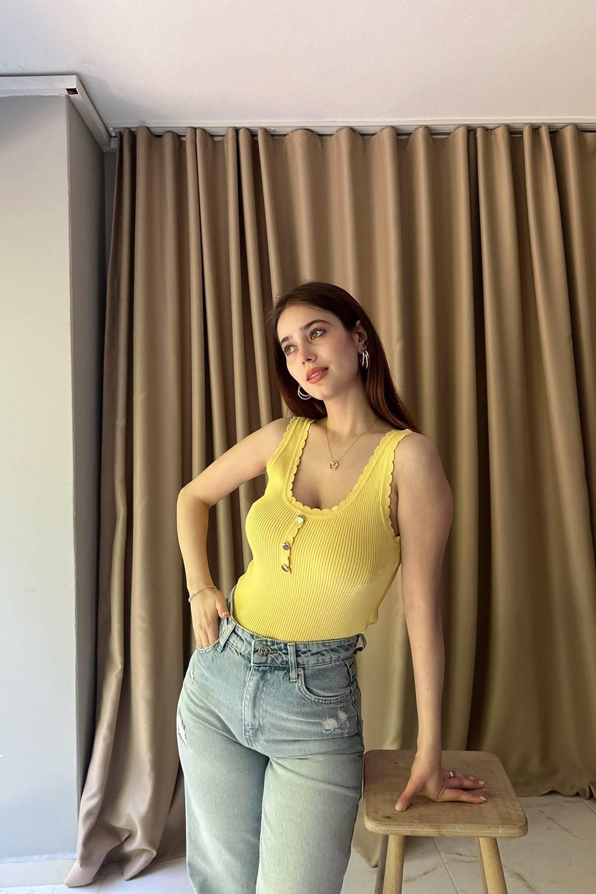 lizge giyim FİTİLLİ DÜĞME DETAYLŞI TRIKO BLUZ