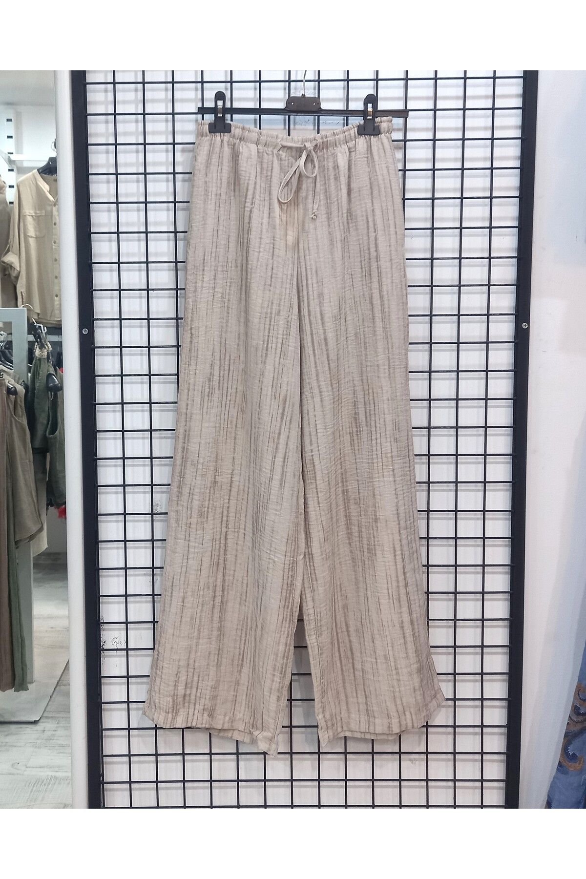 Butik Şans Lastikli Bel Cep Detaylı Bol Paça Pantolon