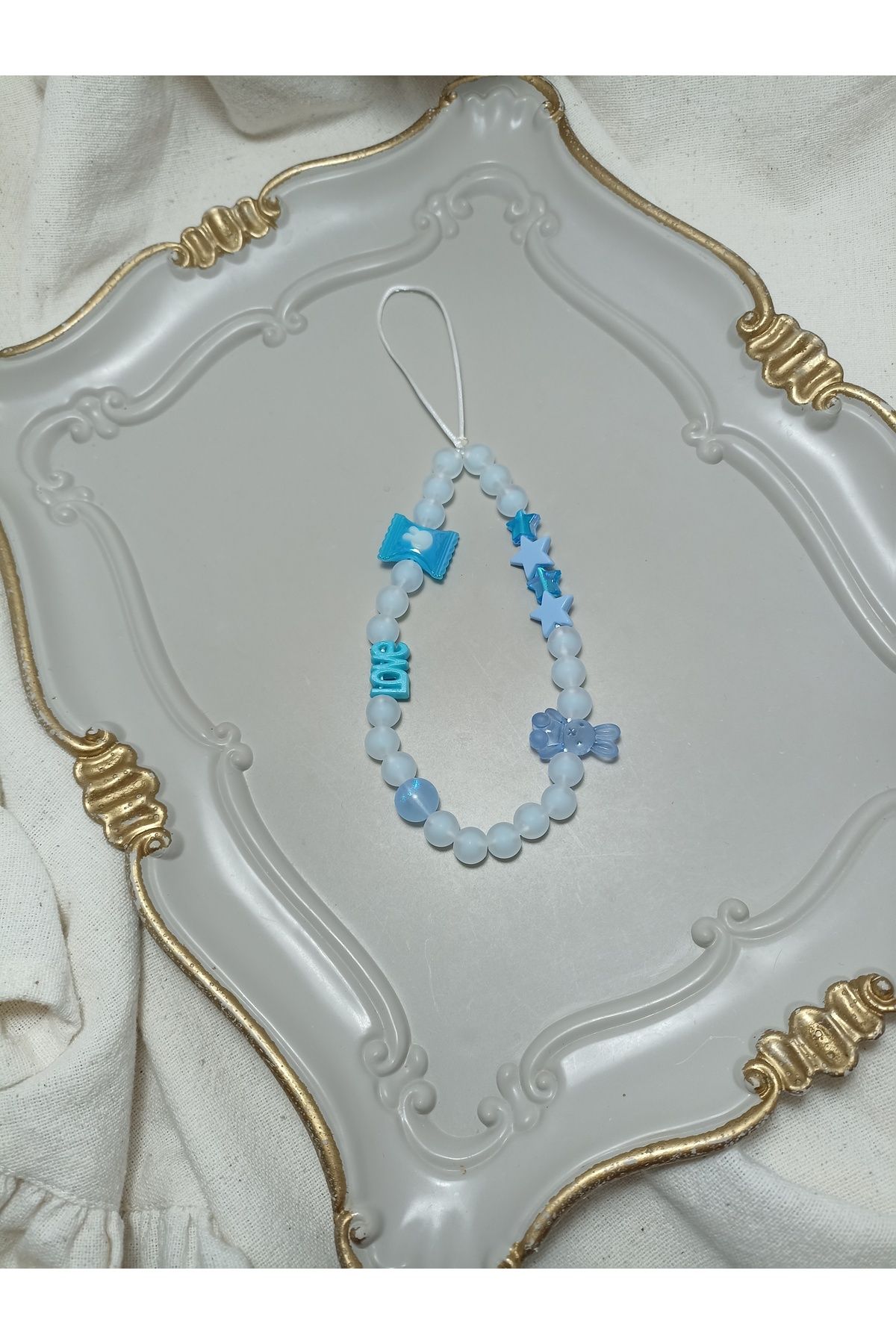 ida design store mavi boncuk ile mavi tavşan love ve yıldız detaylı çanta ve telefon süsü