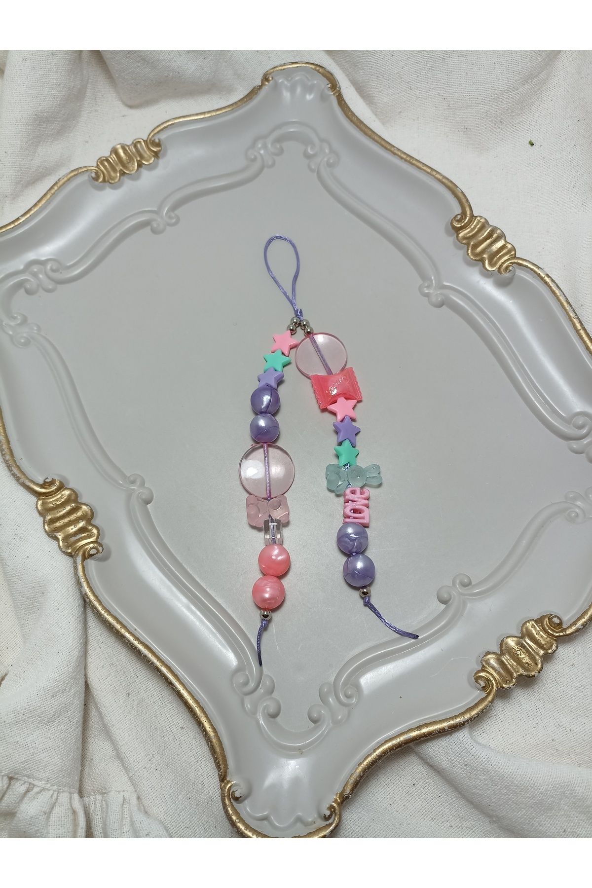 ida design store mor ve pembe boncuklu yıldız ayıcık ve tavşan figürlü çanta ve telefon charmı