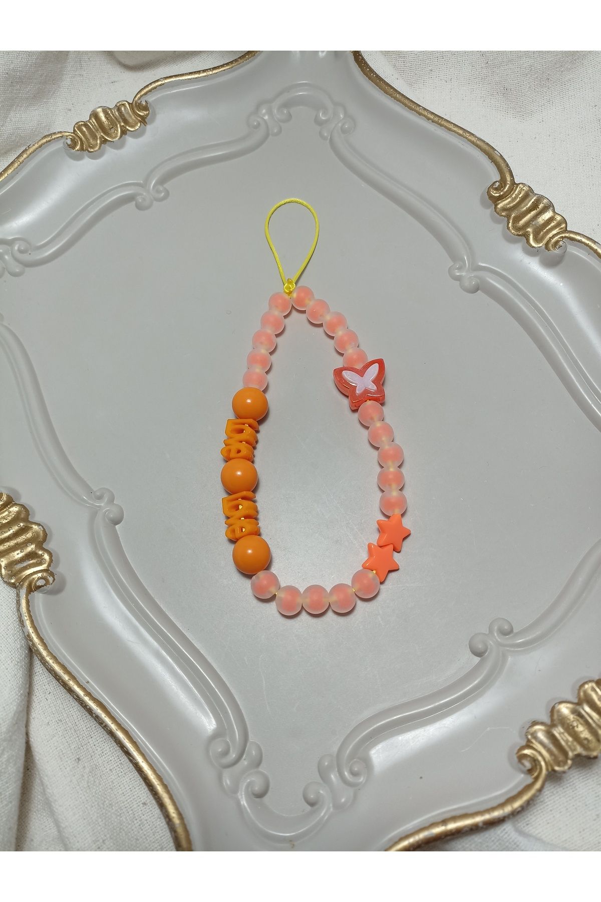 ida design store turuncu boncuklar ile turuncu kelebek yıldız ve love detaylı çanta ve telefon charmı