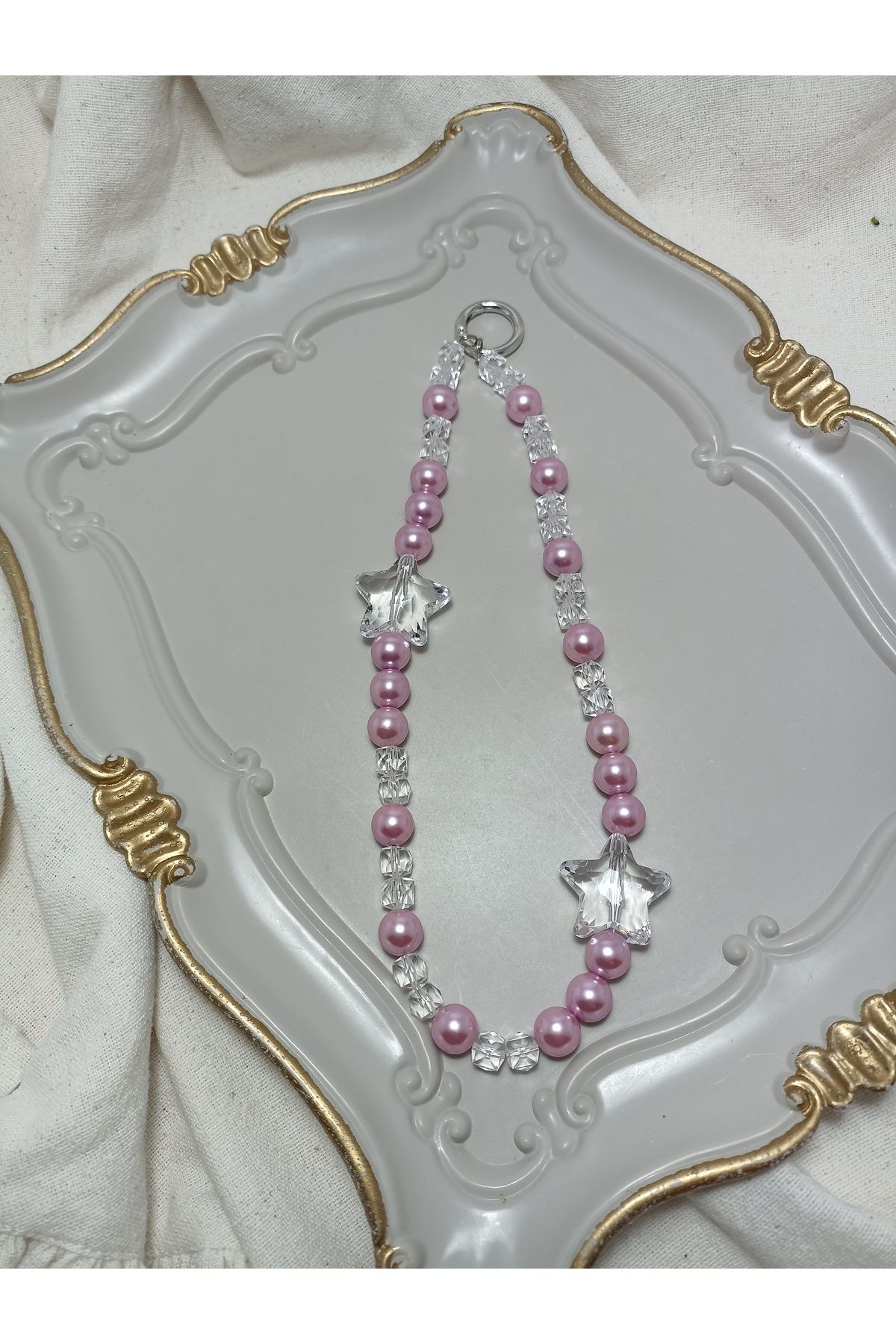 ida design store pembe inci ile küçük kristal boncuklu ve kristal yıldız detaylı çanta ve telefon charmı