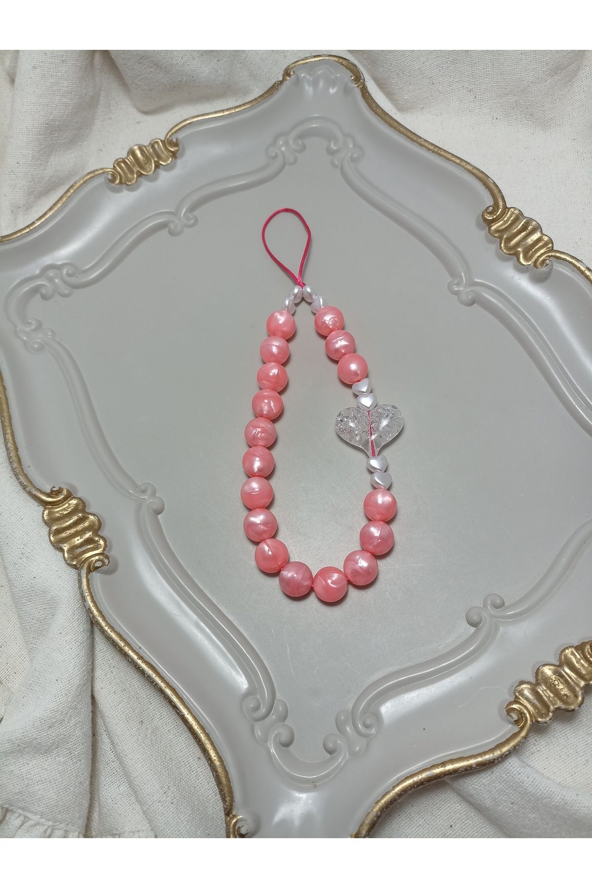 ida design store pembe desenli boncuk ile kalp detaylı çanta ve telefon charmı