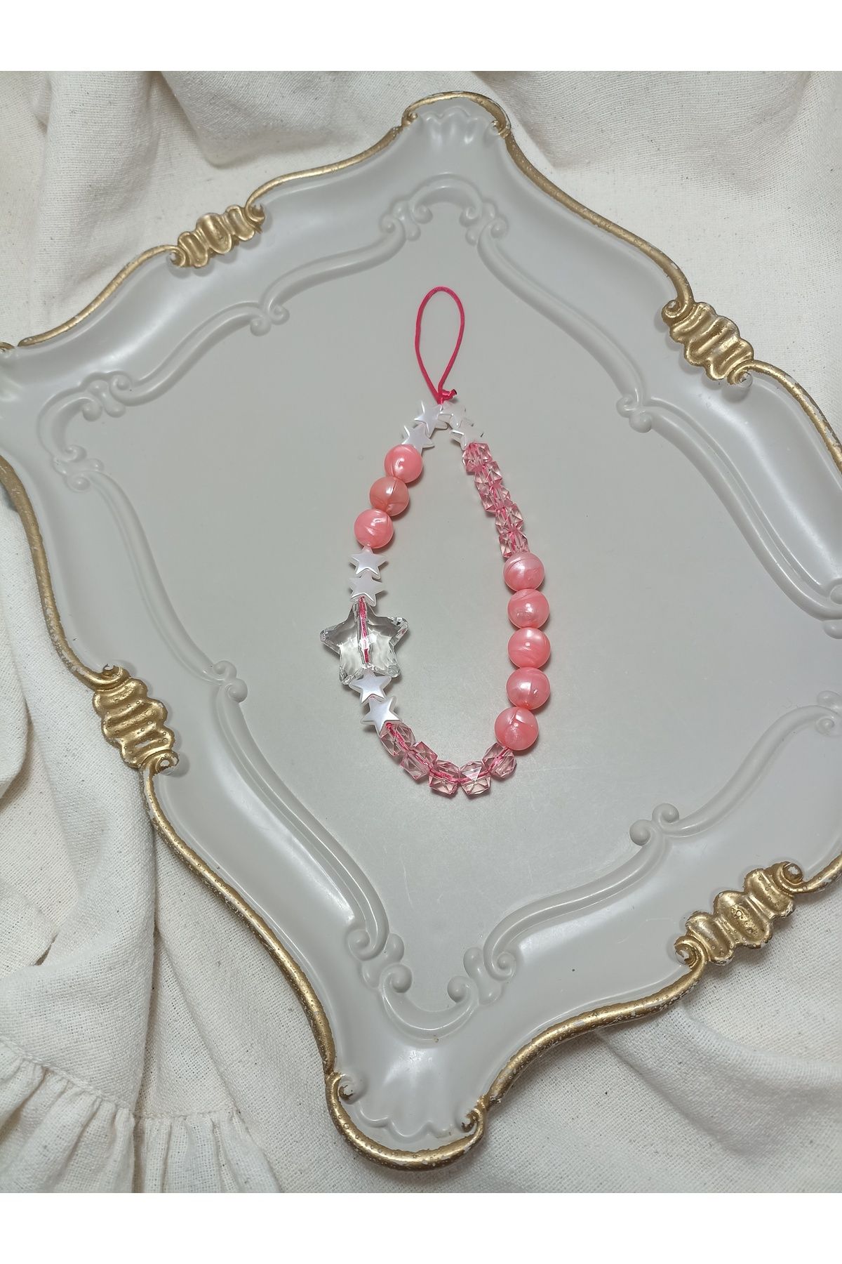 ida design store pembe boncuk ve inci kristal yıldız detaylı çanta ve telefon charmı